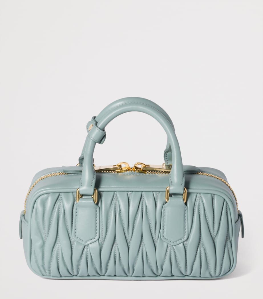 Miu Miu Arcadie top-handle bag matelassé leather, imported from the UK