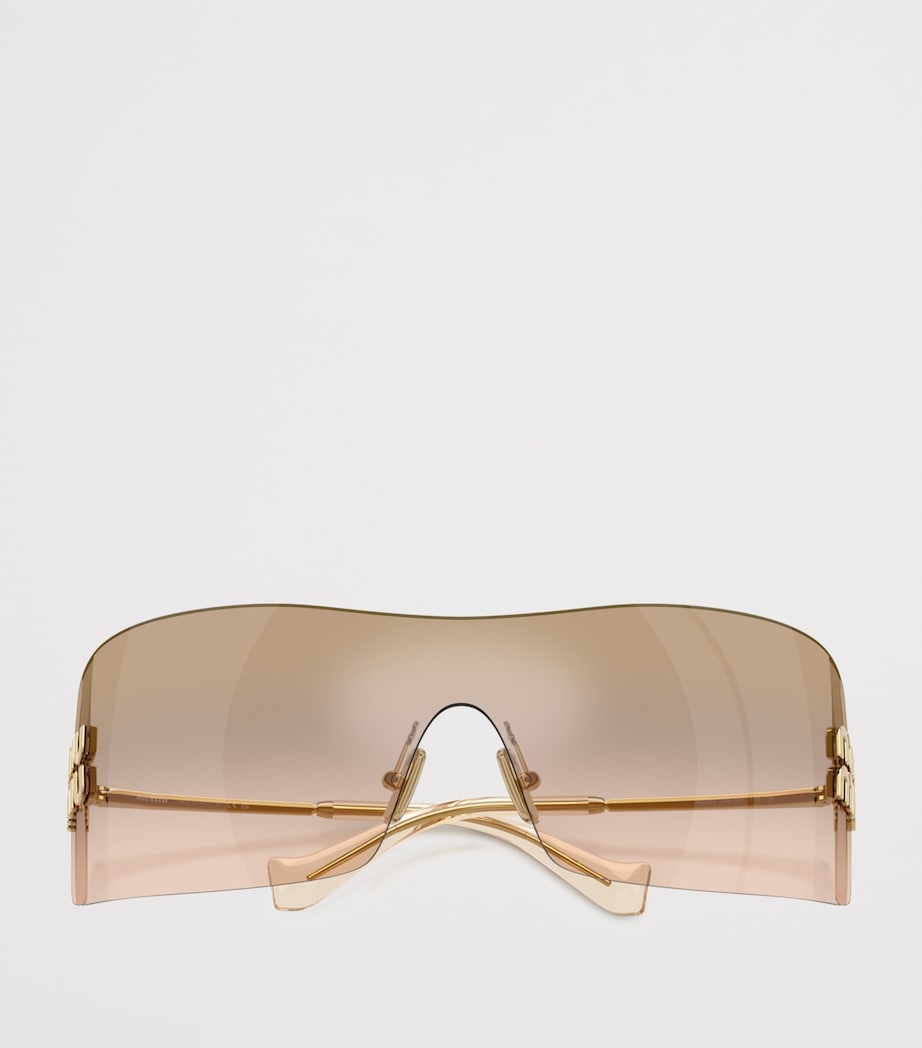 Lunettes de soleil bouclier sans monture Miu Miu avec branches en métal (marque britannique)
