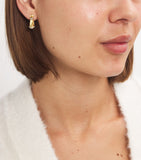 L'Atelier Nawbar yellow gold diamond earrings, imported from the UK