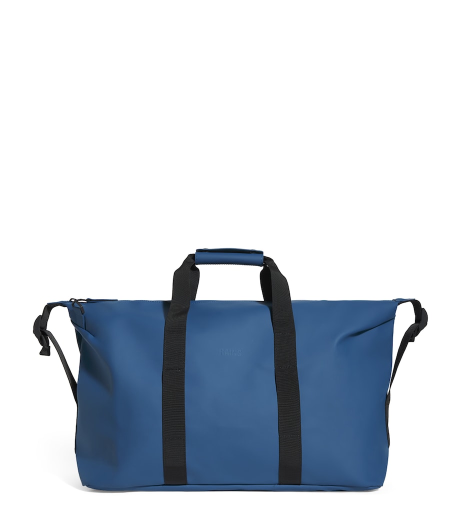 RAINS spacious weekend bag with water-resistant coating, imported from the UK