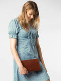 Conkca Cherish leather clutch bag conker brown (British brand)