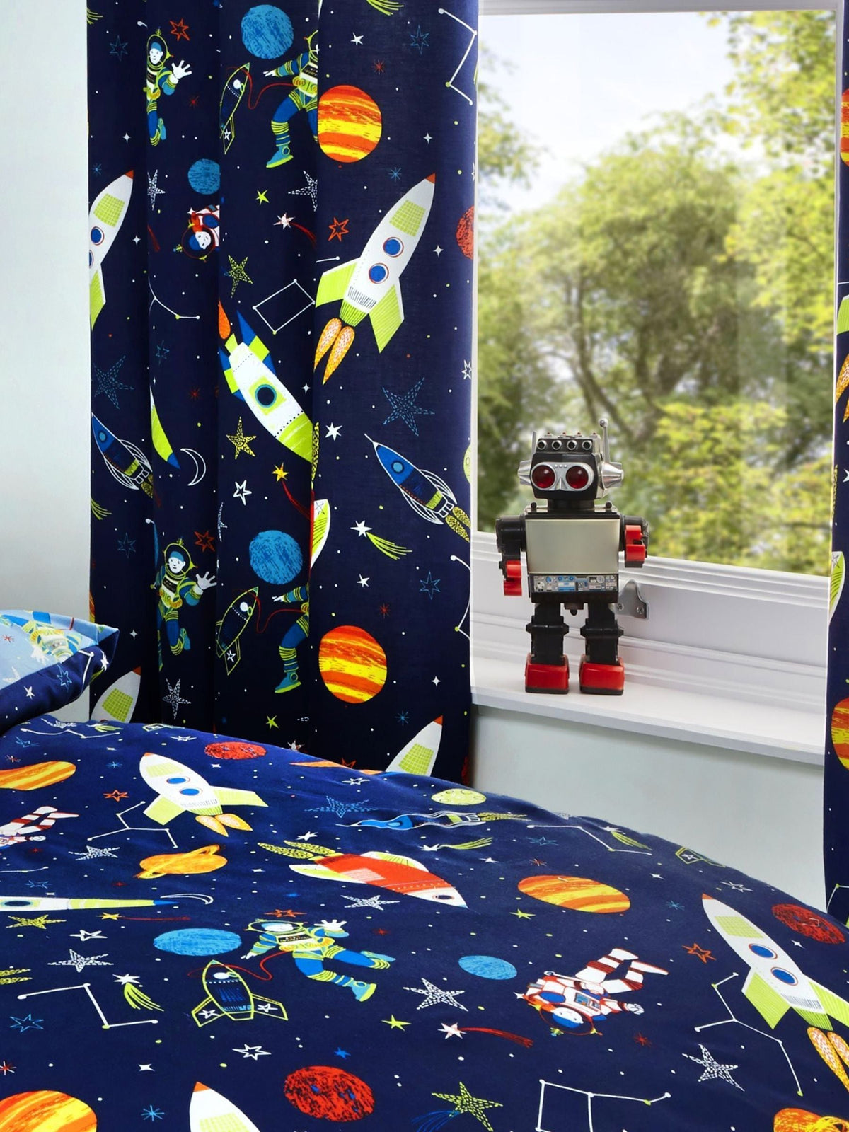 Bedlam Super Sonic pencil pleat curtains with glow-in-the-dark stars (British brand)