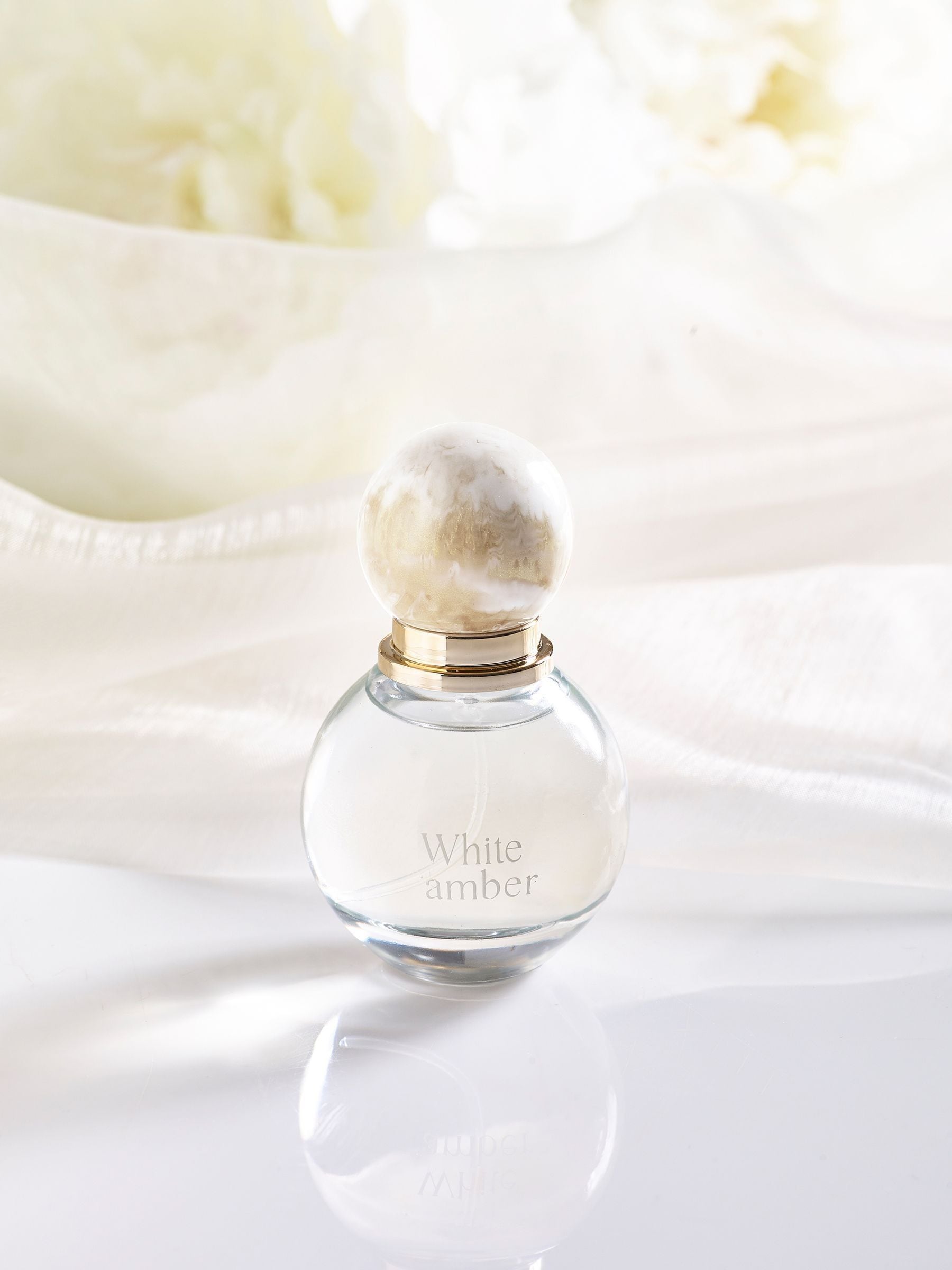 White Amber perfume bottle 100ml (British brand)