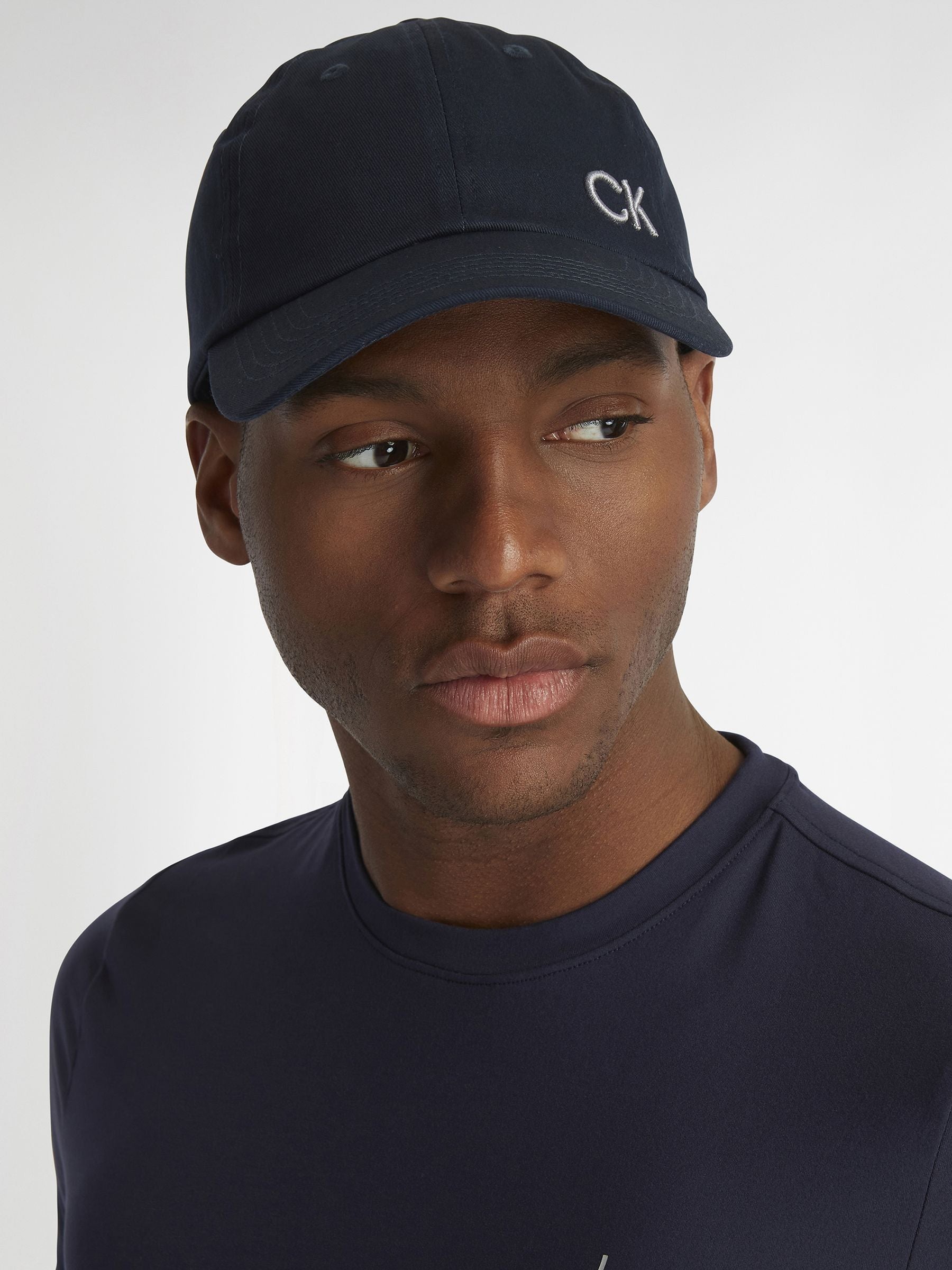 Calvin Klein Golf black cotton twill adjustable cap imported from the UK