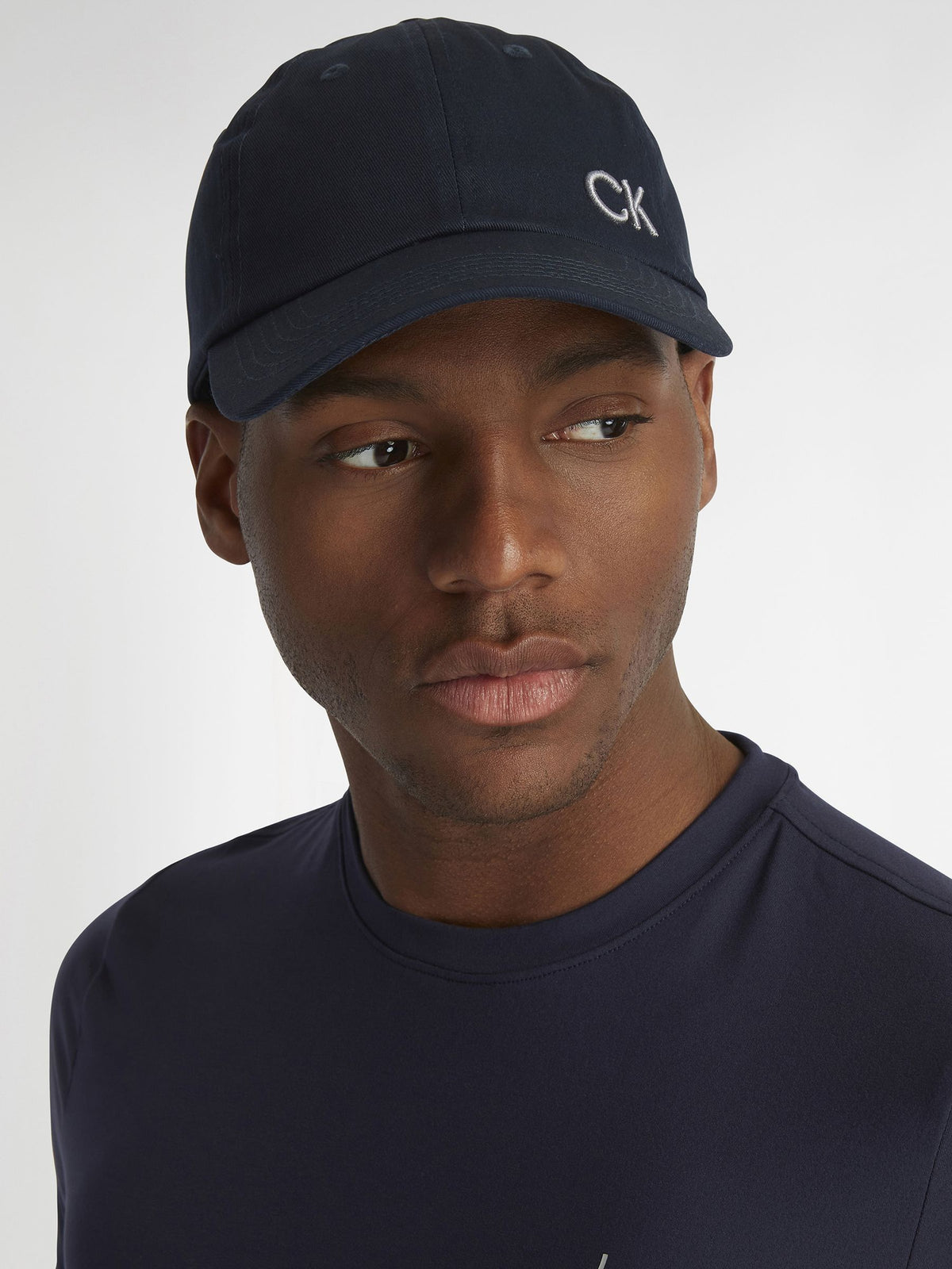 Calvin Klein Golf black cotton twill adjustable cap imported from the UK