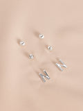 Silver tone initial stud earrings pack (British brand)
