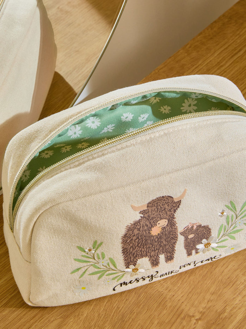 Makeup bag featuring Hamish the Highland Cow design, imported from the UK