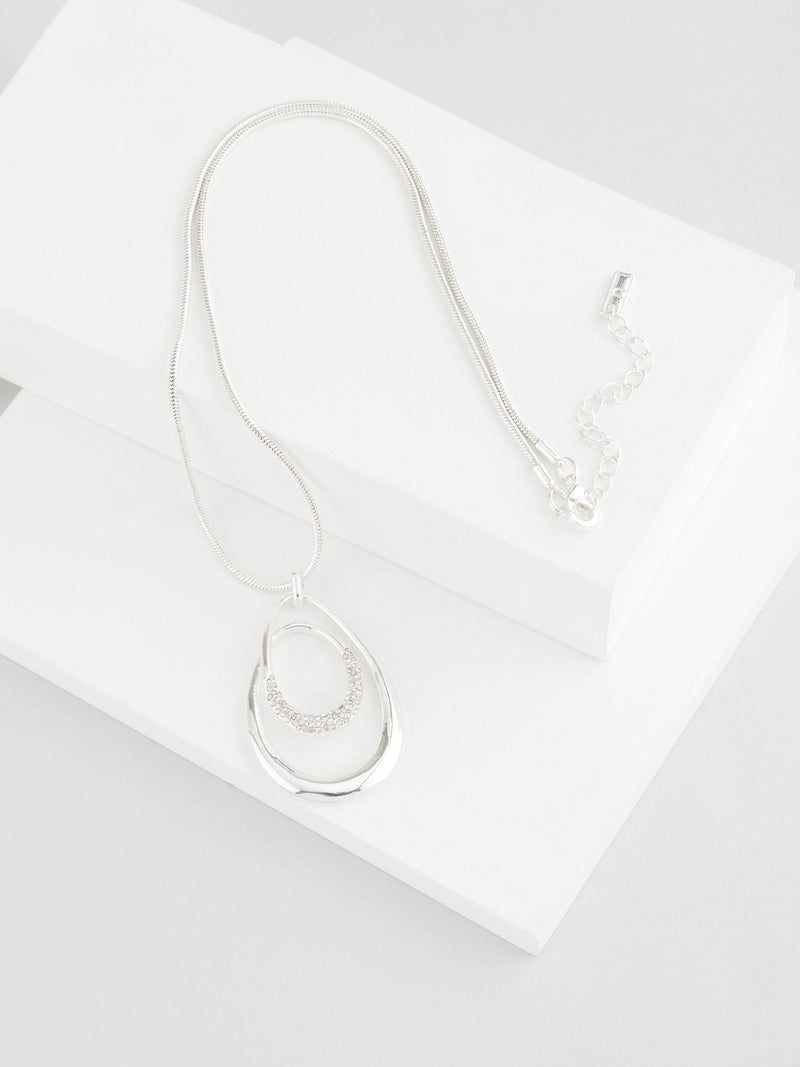 Silver tone necklace with swirl oval pave design - British product