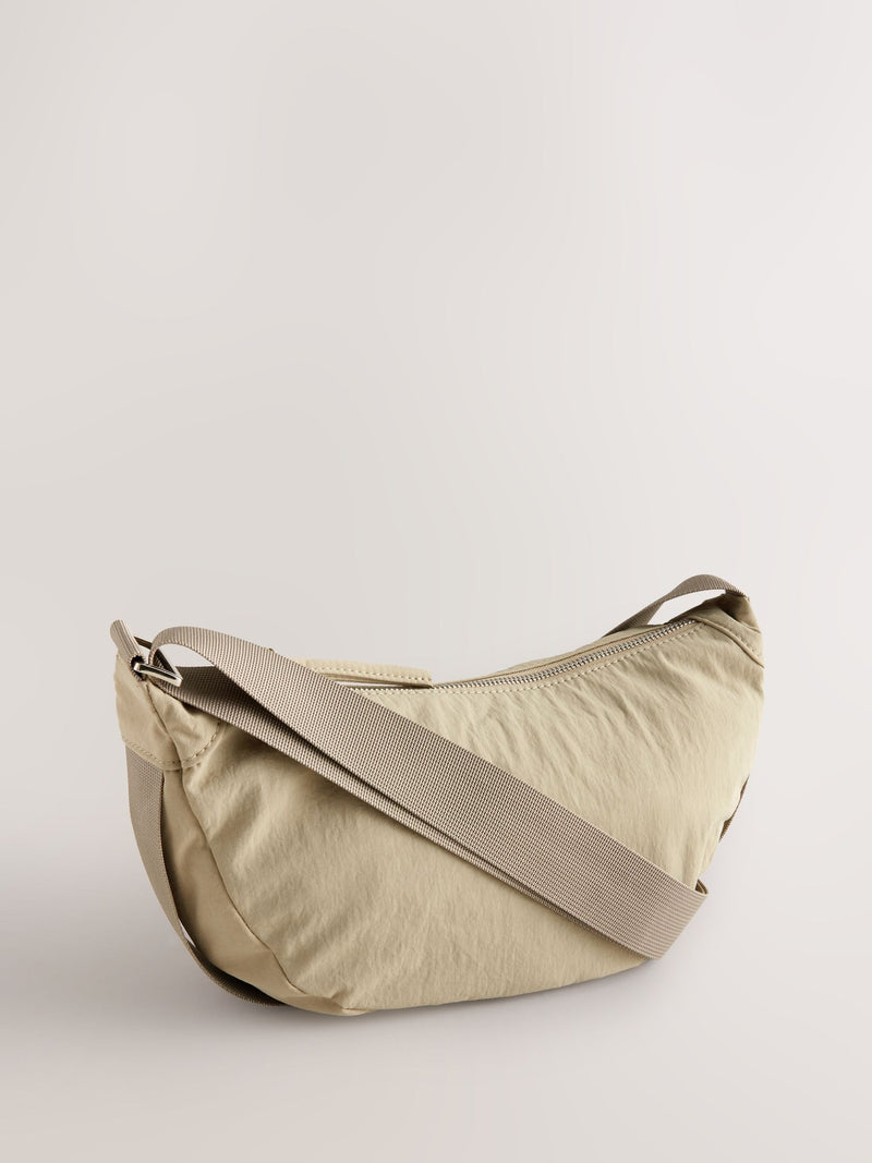 Stone sling bag with adjustable strap, imported from the UK