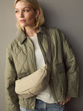 Stone sling bag with adjustable strap, imported from the UK