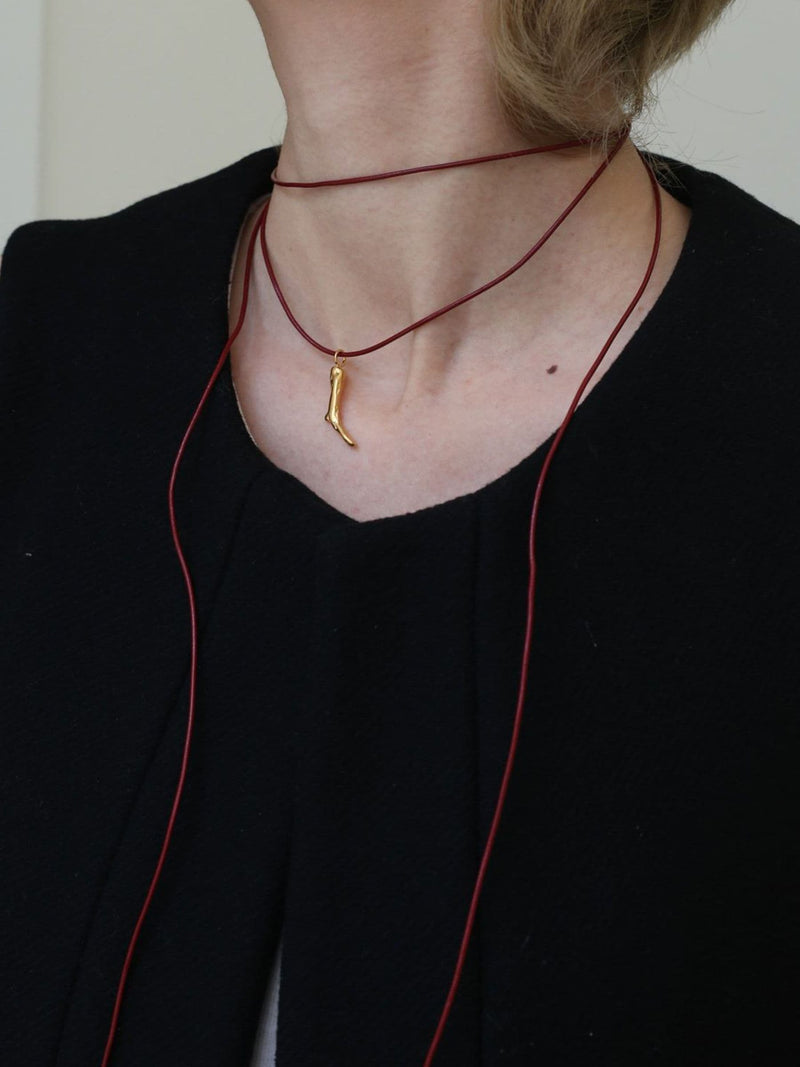 Hermina Gold Tone Molten Coral Cord Necklace, UK version