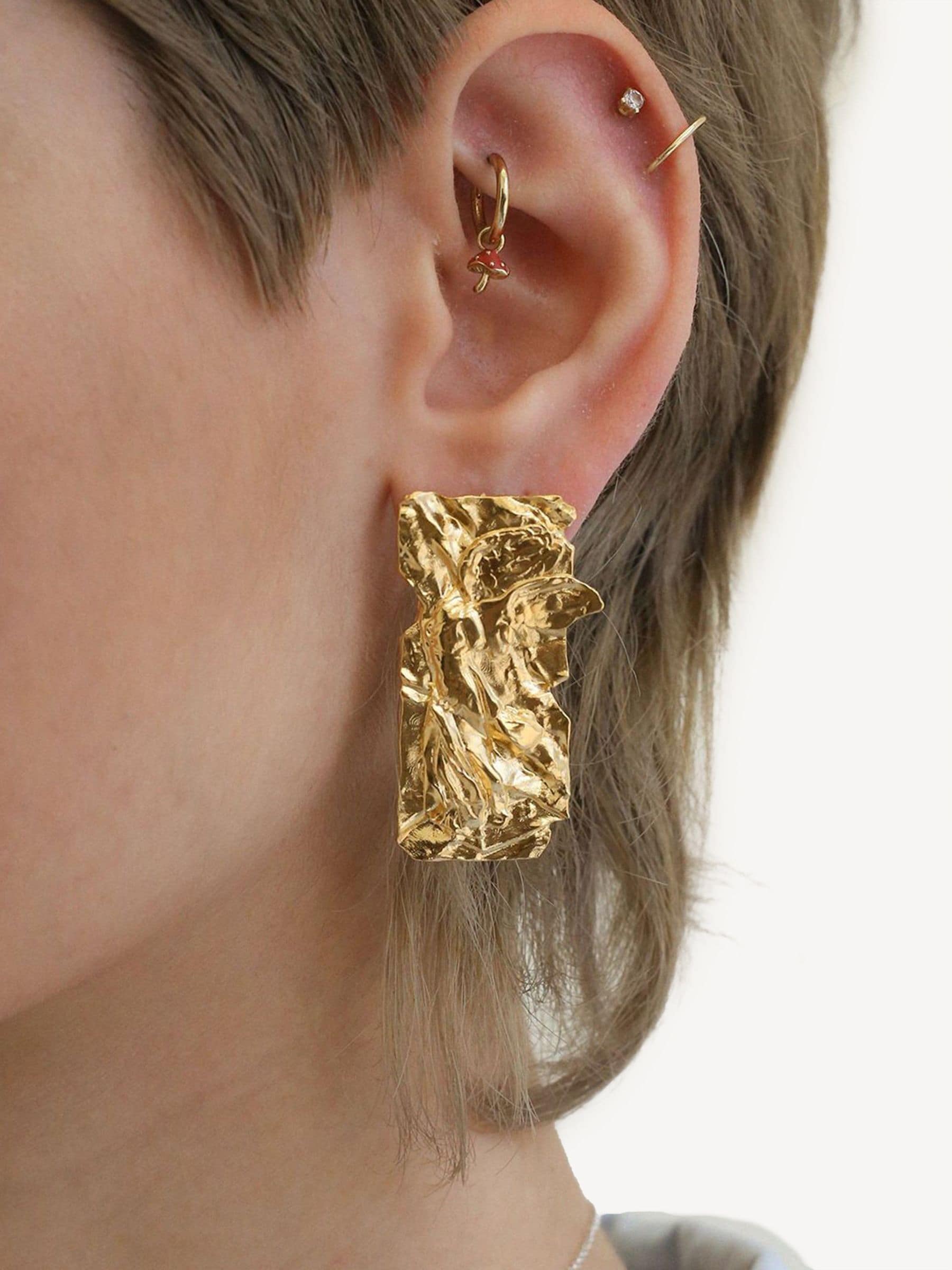 Hermina Athens gold plated Nike foil earrings, UK version
