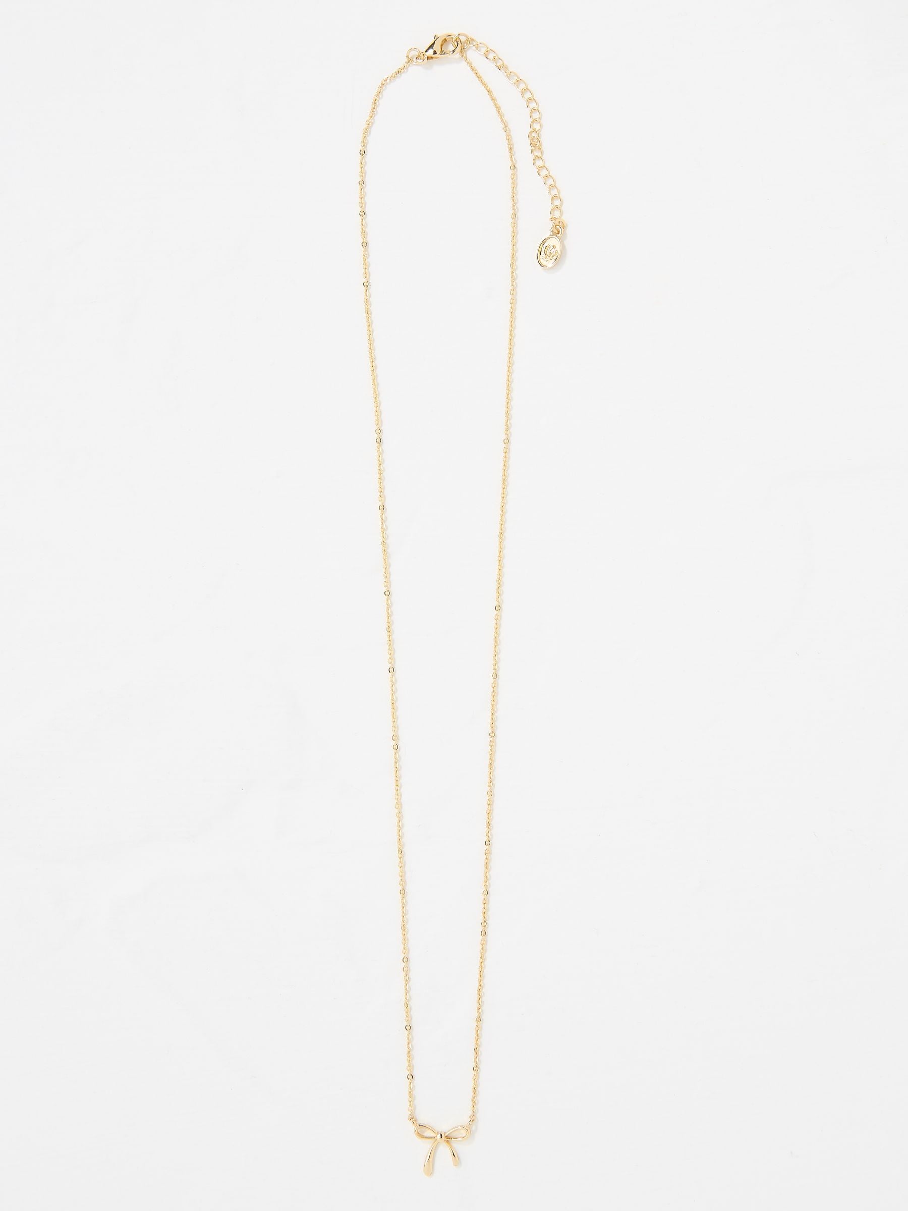 FatFace Gold Tone Bow Pendant Necklace