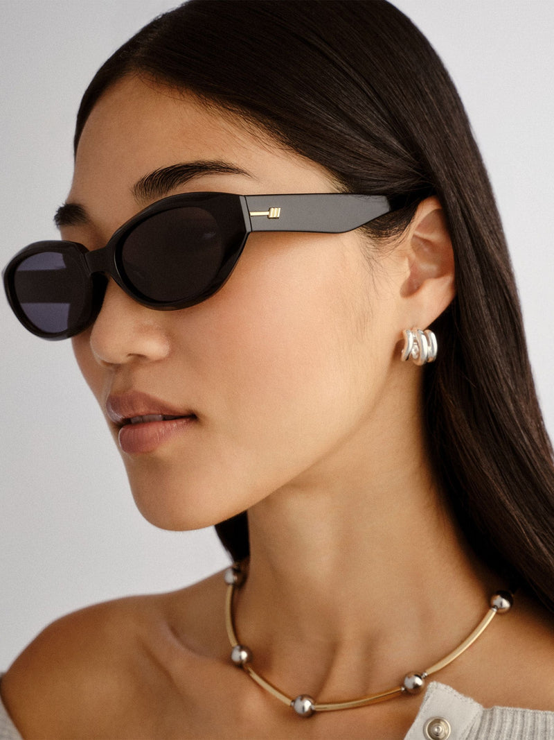 Le Specs Le Bijou black oval sunglasses smoke lenses, imported from the UK