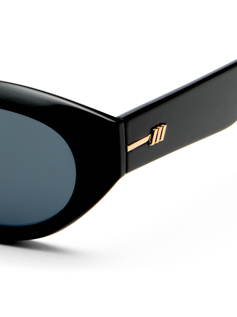 Le Specs Le Bijou black oval sunglasses smoke lenses, imported from the UK