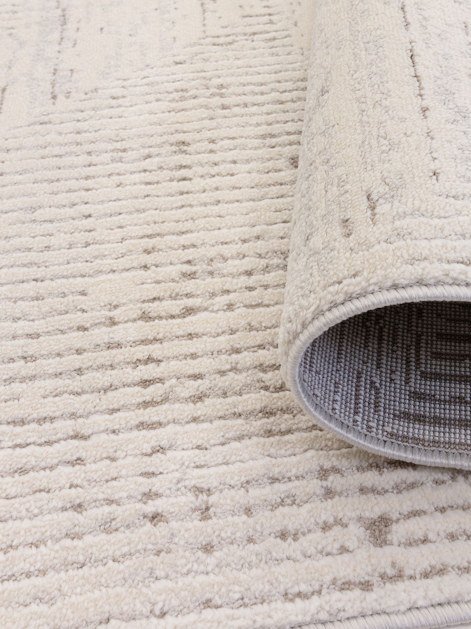 The Rug Edit Cream Axel Linear rug (British brand)