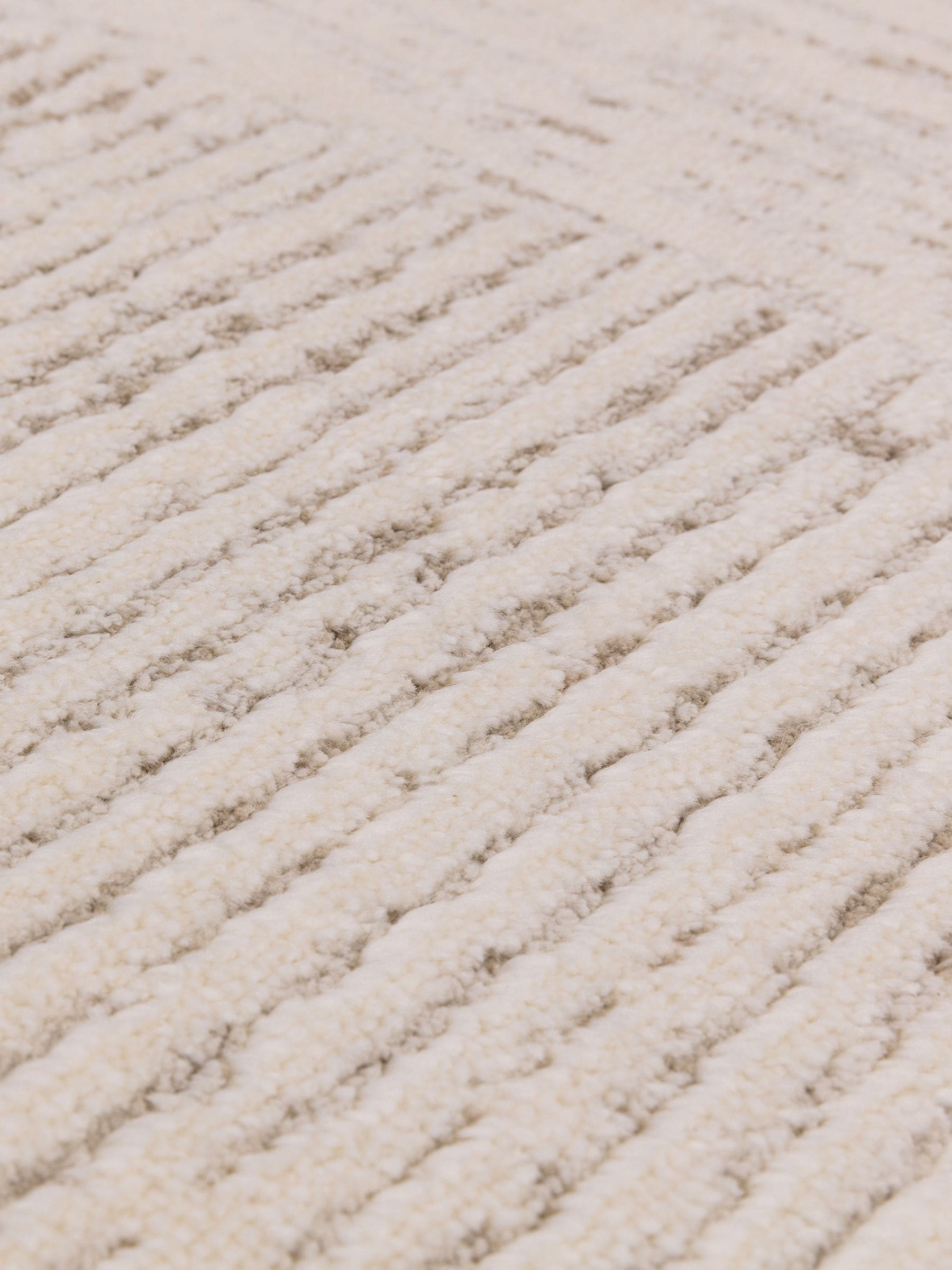 The Rug Edit Cream Axel Linear rug (British brand)