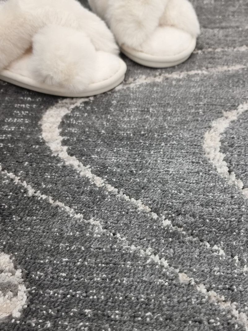 The Rug Edit Axel Wave rug in charcoal, UK version