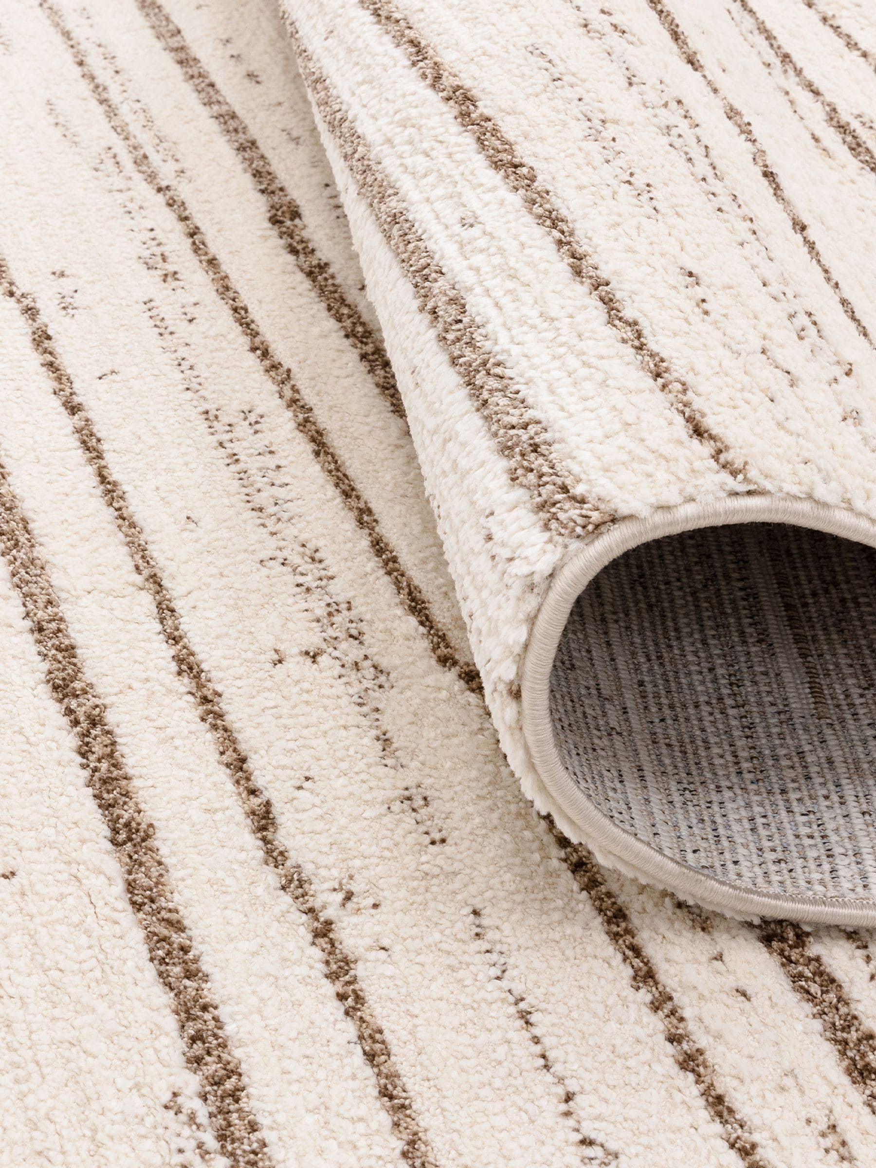 The Rug Edit cream Oslo broken stripes rug - British product