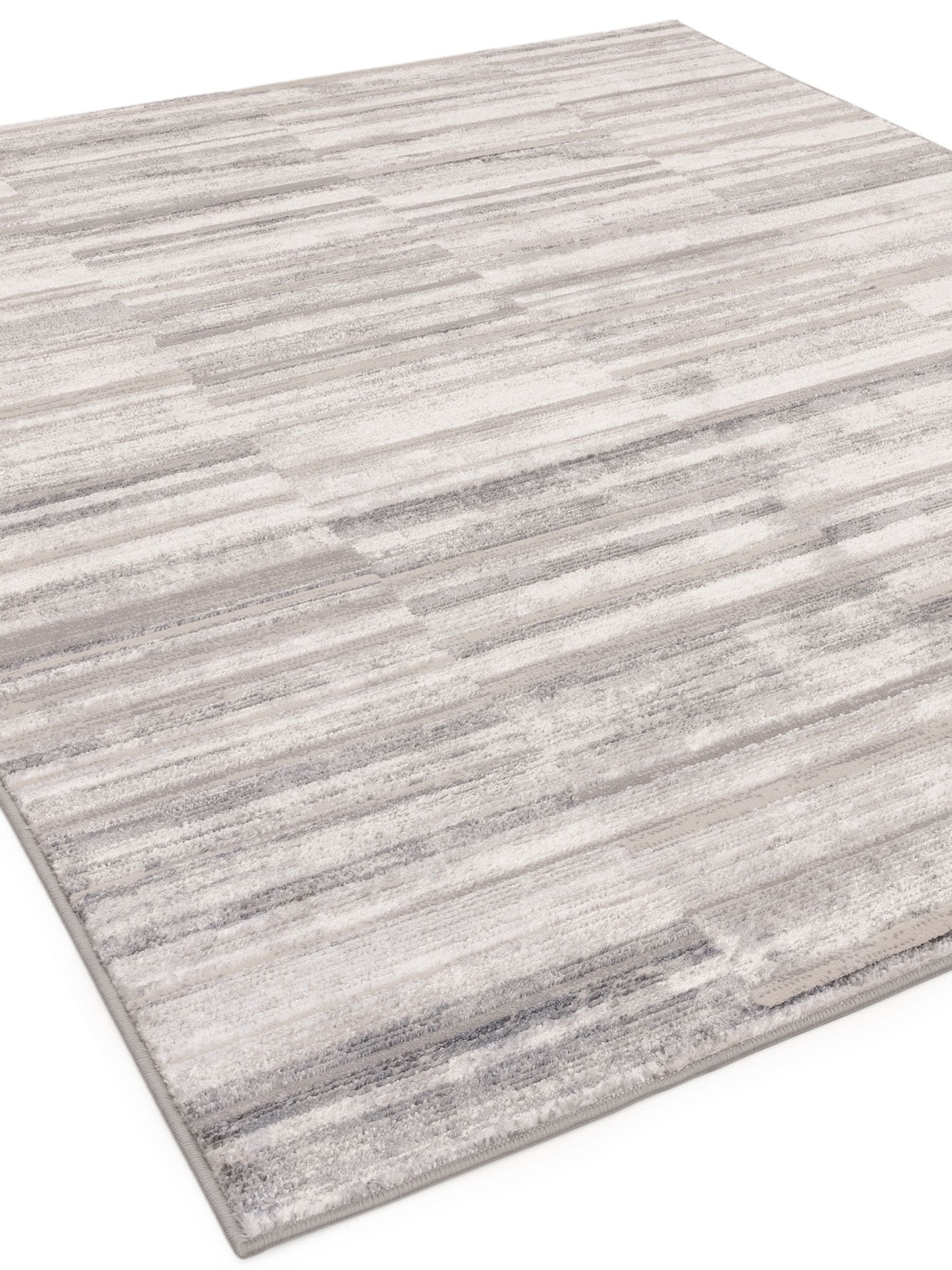 The Rug Edit grey Ritz Grid rug 100% polyester, imported from the UK