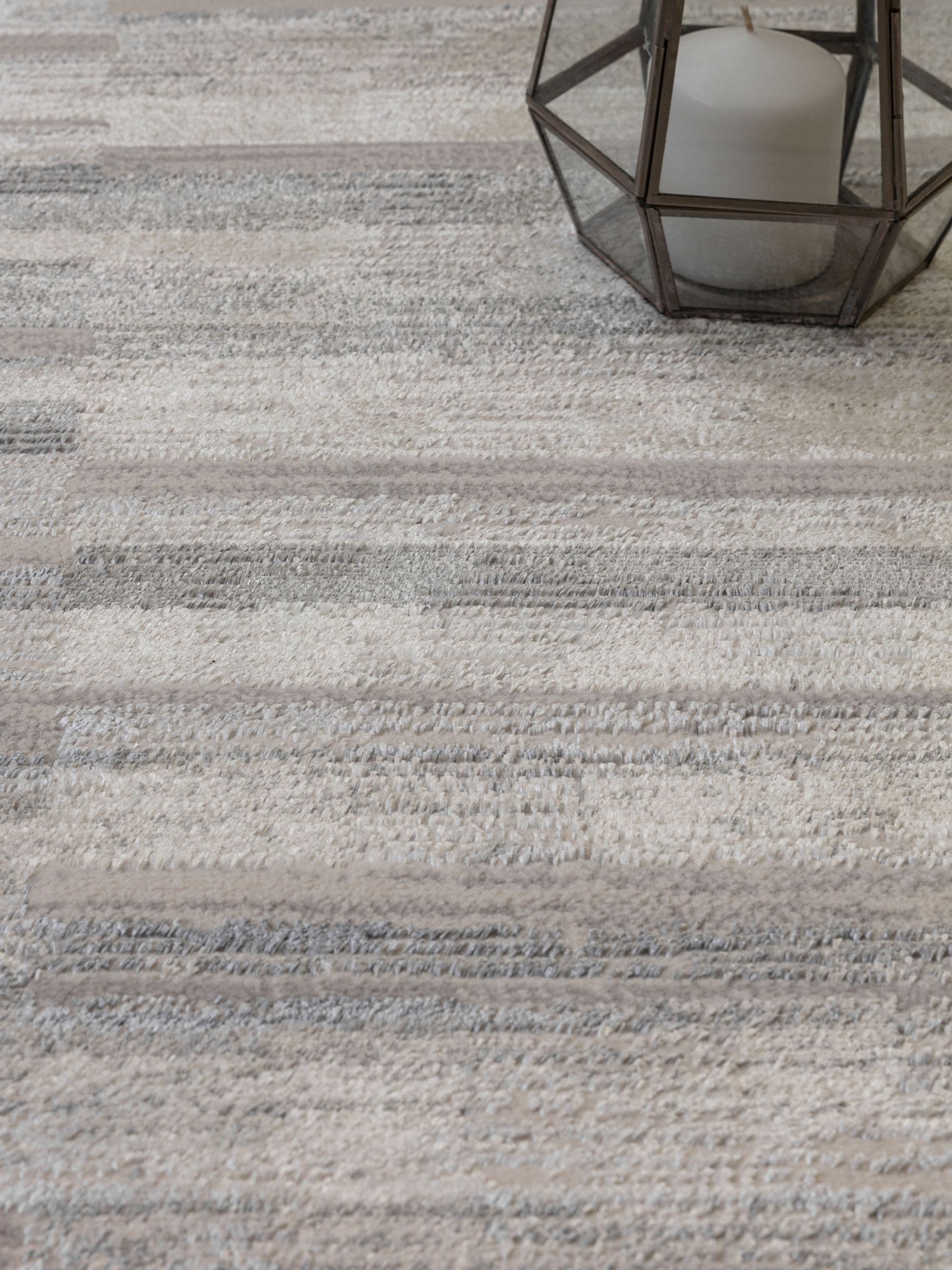 The Rug Edit grey Ritz Grid rug 100% polyester, imported from the UK