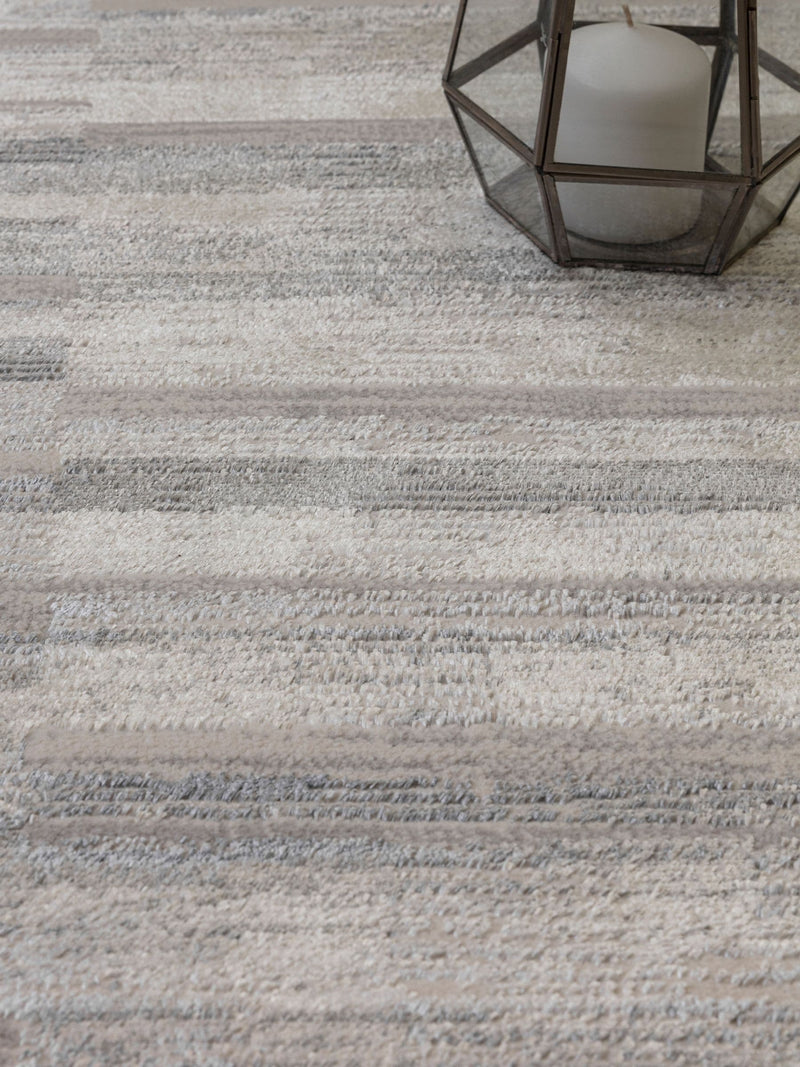 The Rug Edit grey Ritz Grid rug 100% polyester, imported from the UK
