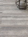 The Rug Edit grey Ritz Grid rug 100% polyester, imported from the UK