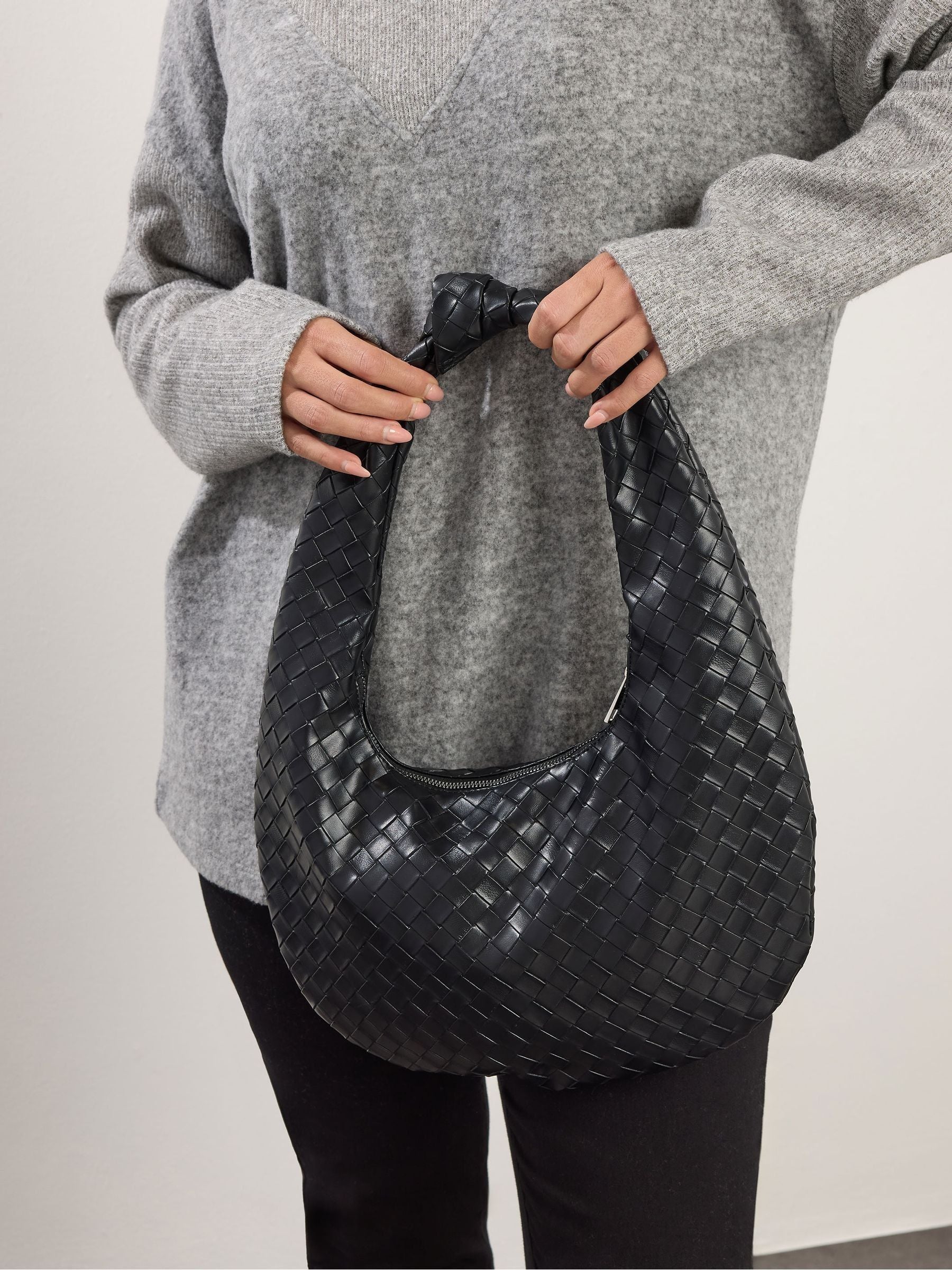 Yours Curve black woven shoulder bag with knot detail, imported from the UK