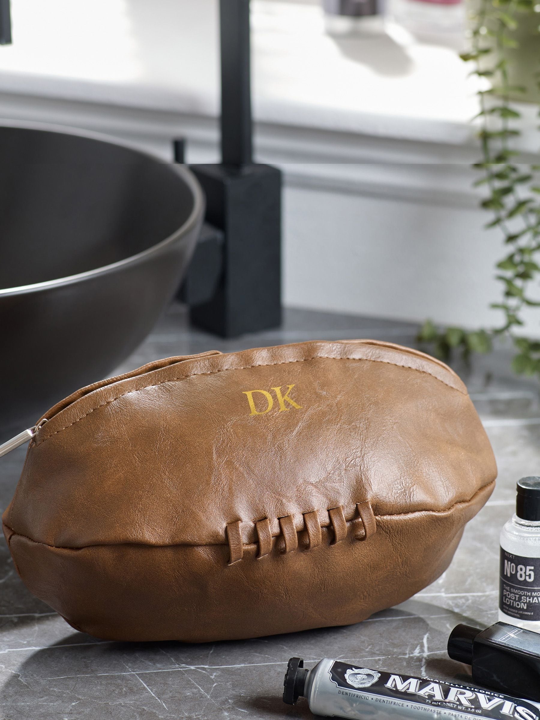 Personalised rugby-shaped washbag in vintage tan, UK version