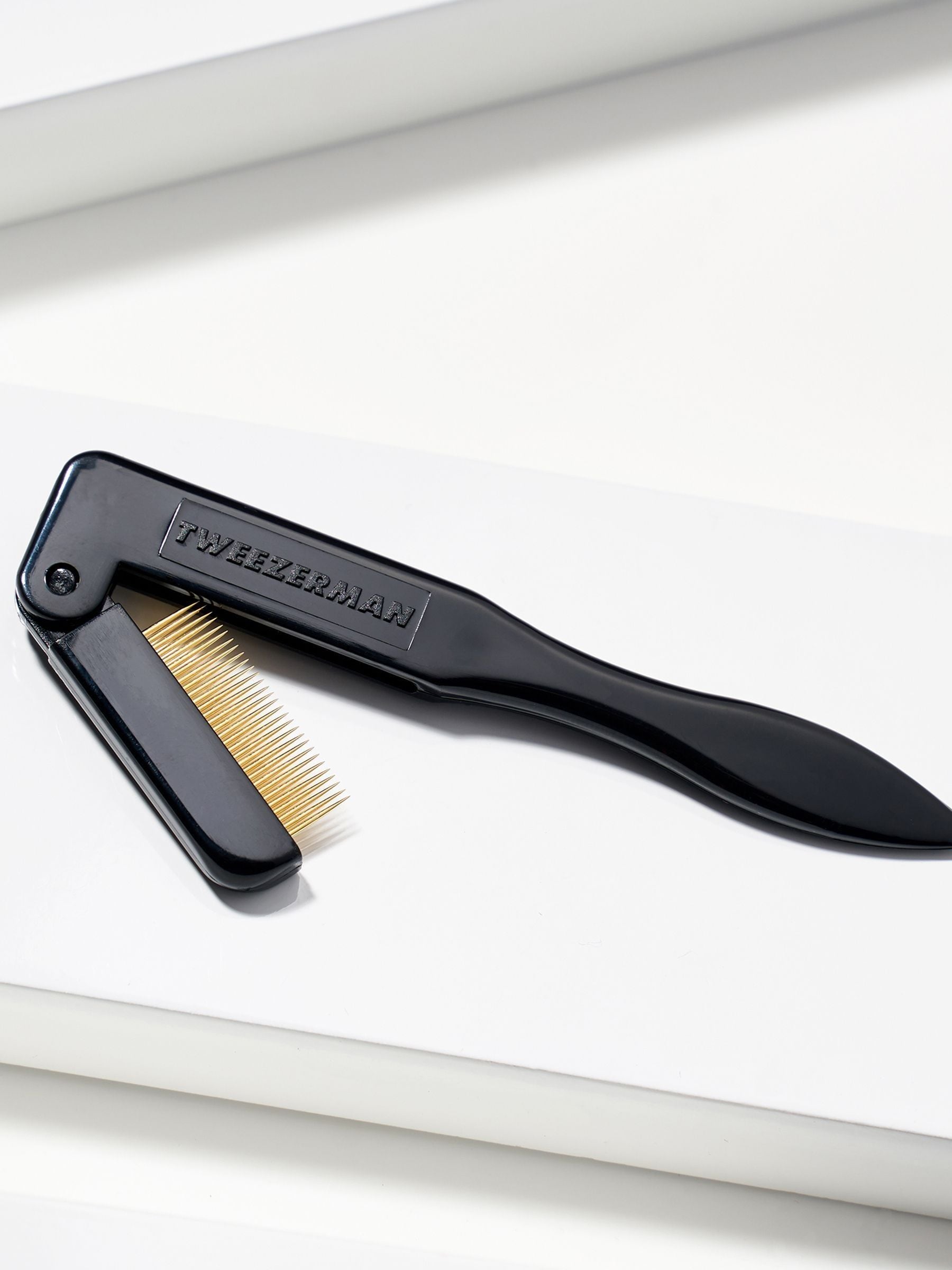 Tweezerman folding lash comb makeup tool, UK version