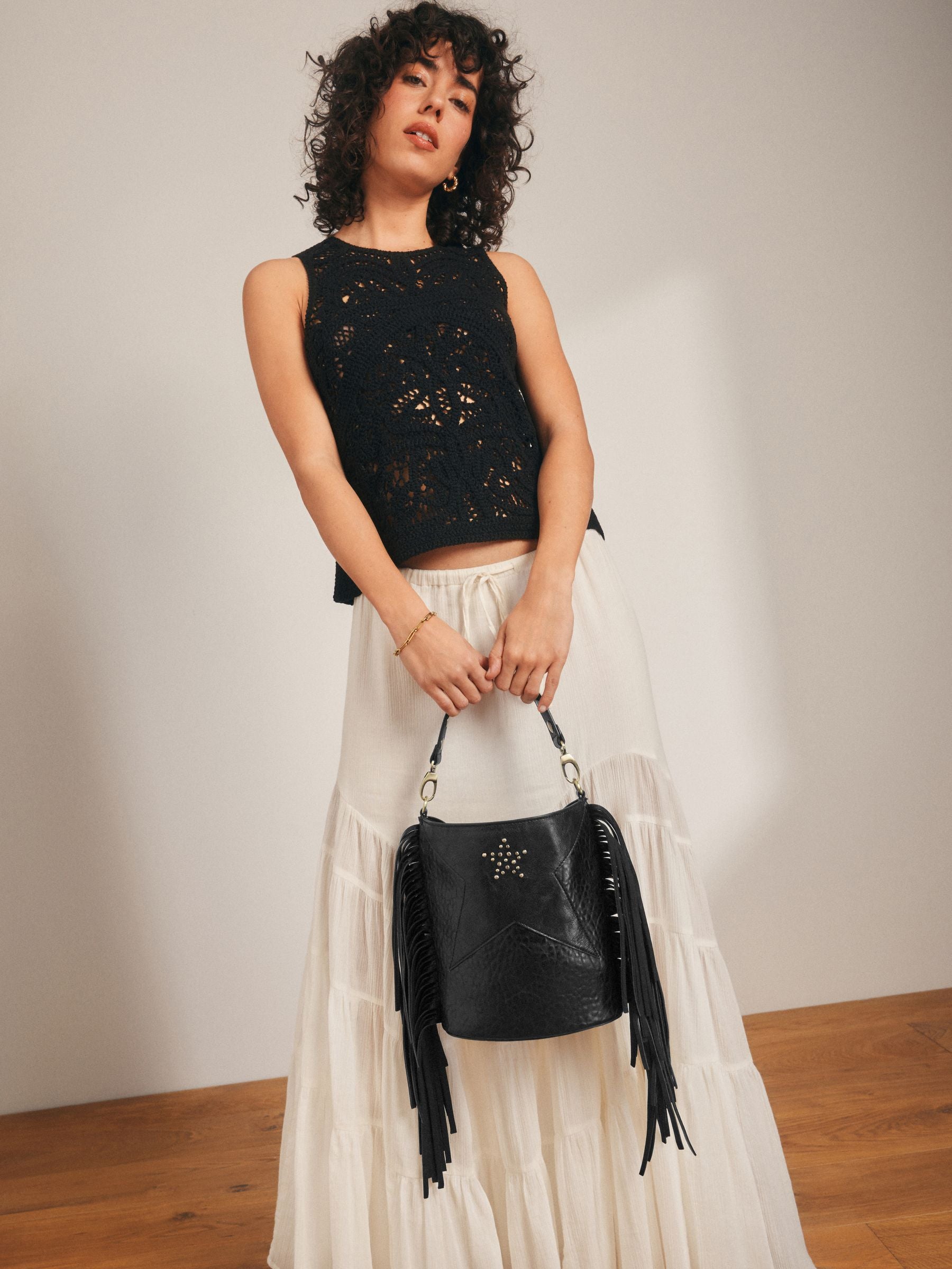 Rockett St George black studded star cross-body bucket bag (British brand)