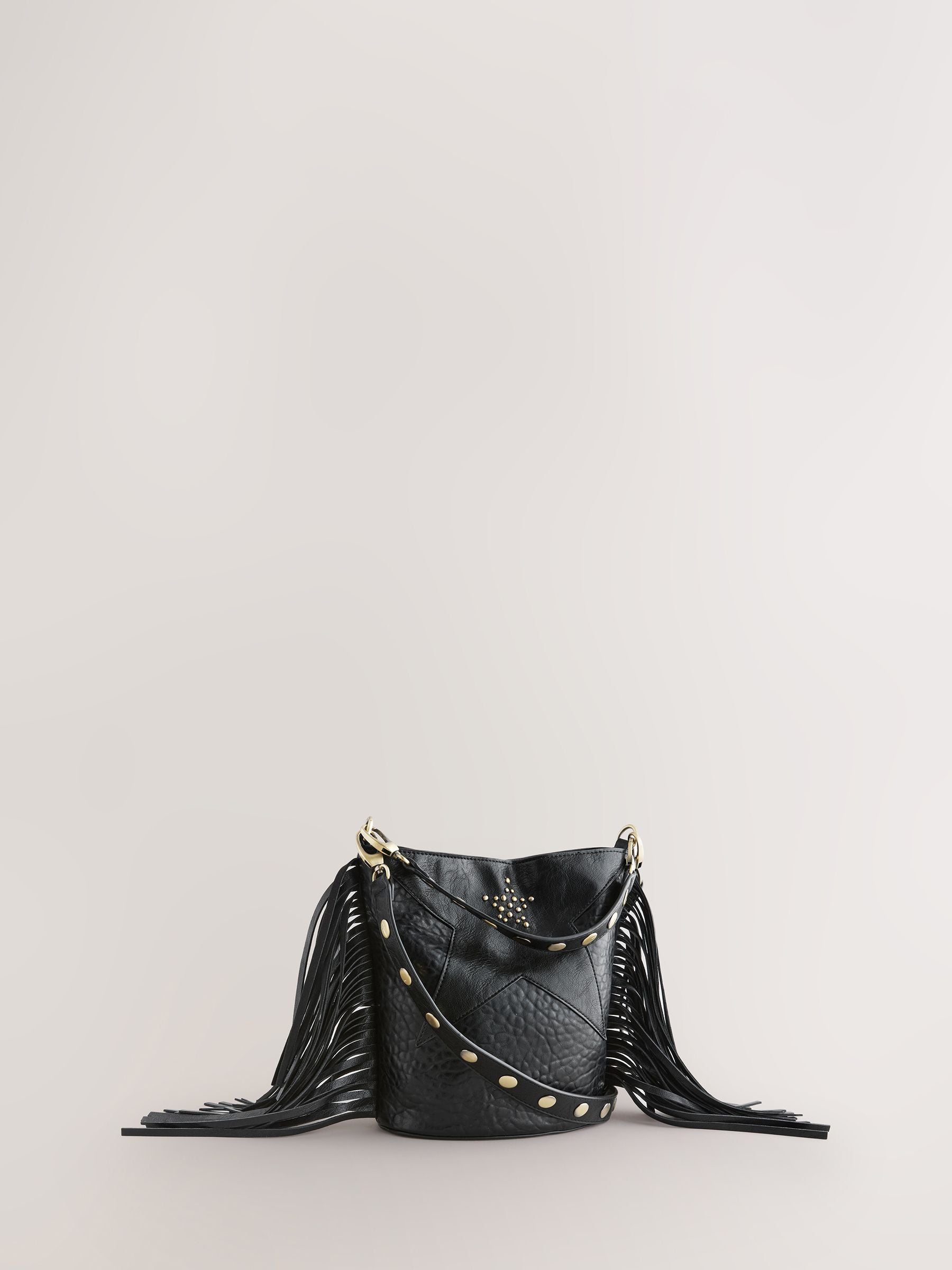 Rockett St George black studded star cross-body bucket bag (British brand)