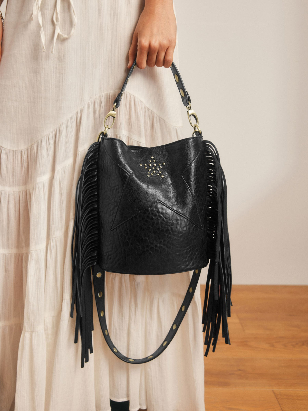 Rockett St George black studded star cross-body bucket bag (British brand)