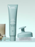 Aveda scalp massager with flexible bristles, imported from the UK