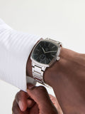 silver tone square dial watch with metal bracelet (British brand)