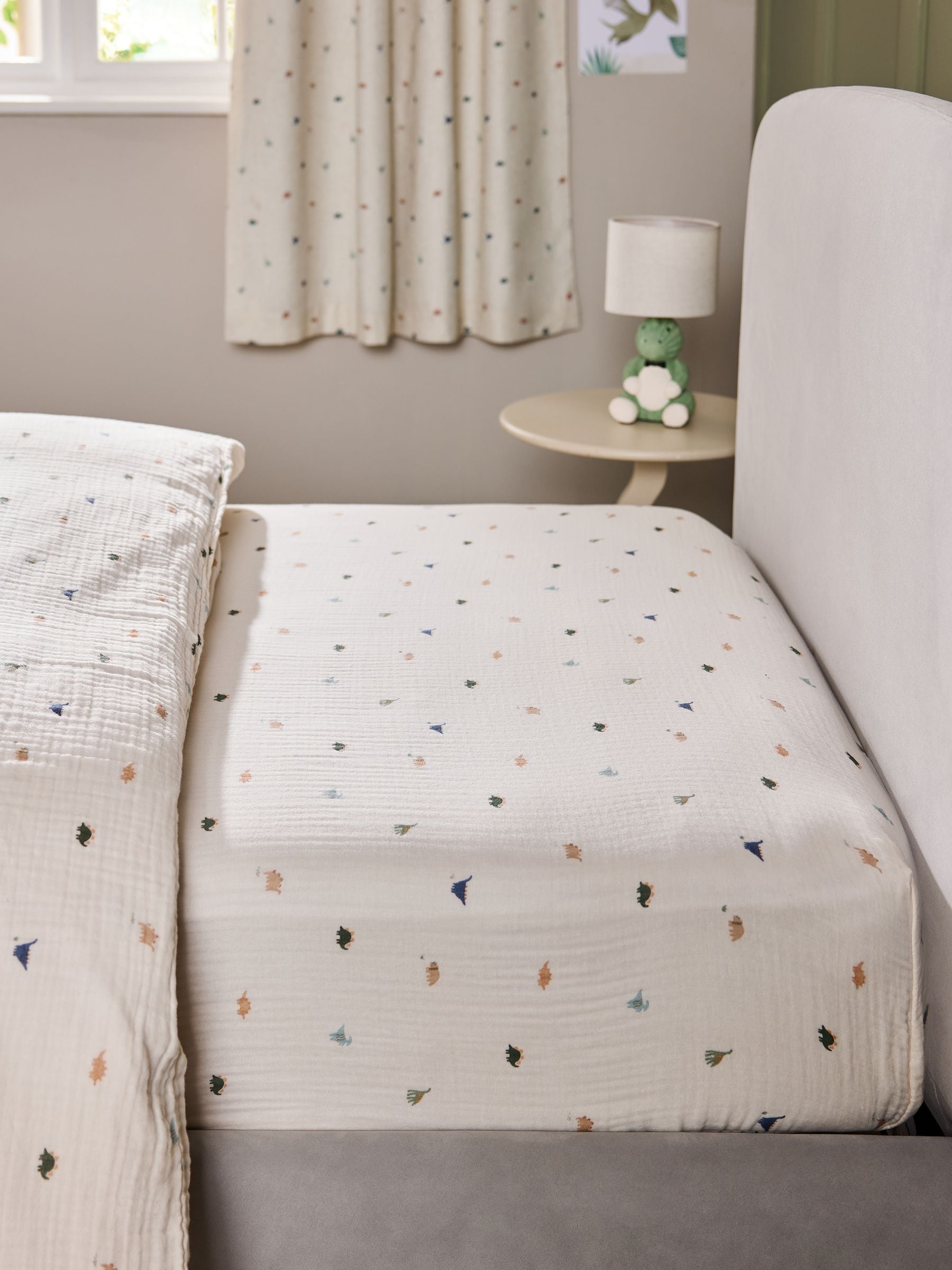 Mini Dino muslin fitted sheet dinosaur print, imported from the UK