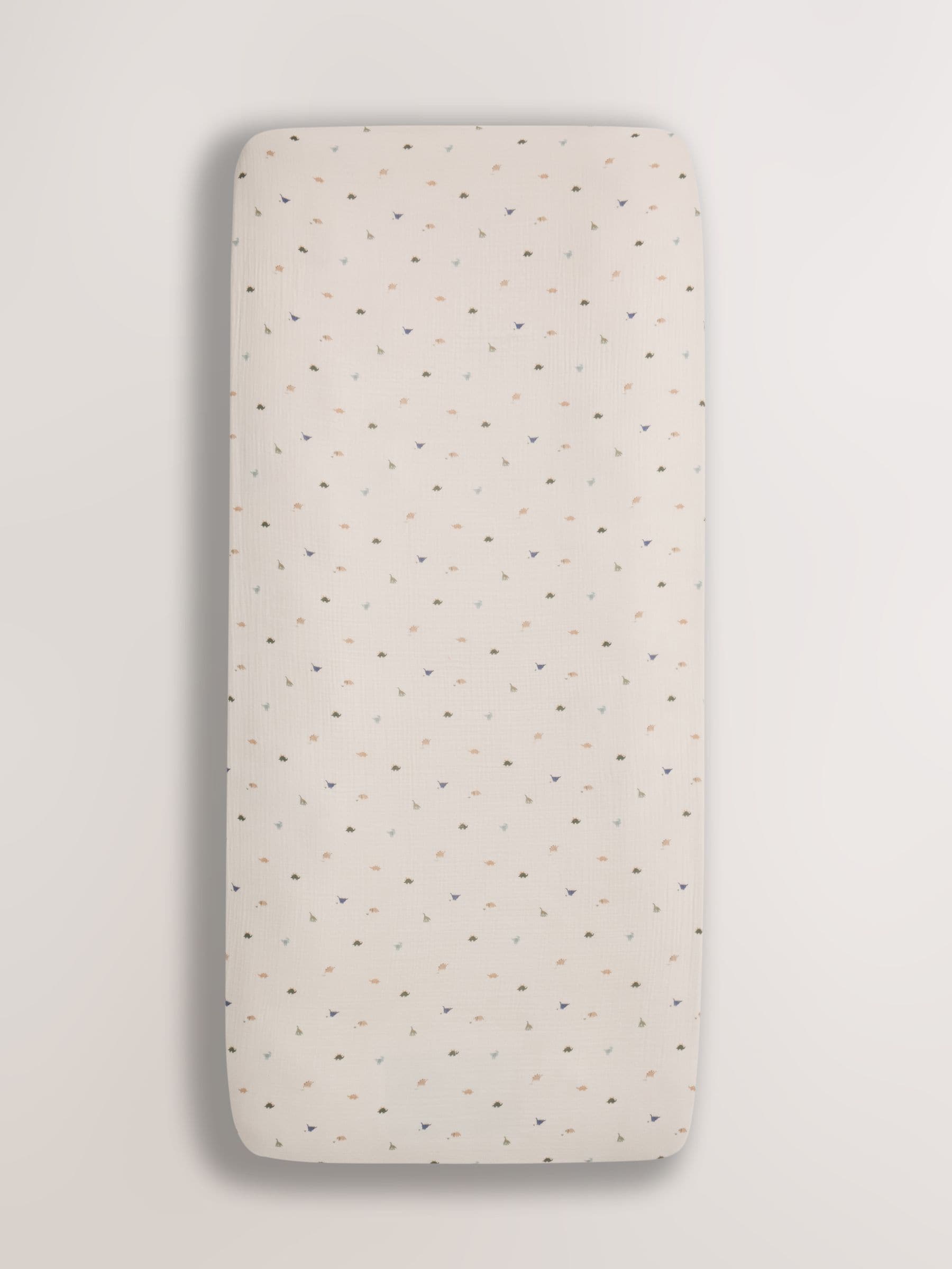 Mini Dino muslin fitted sheet dinosaur print, imported from the UK