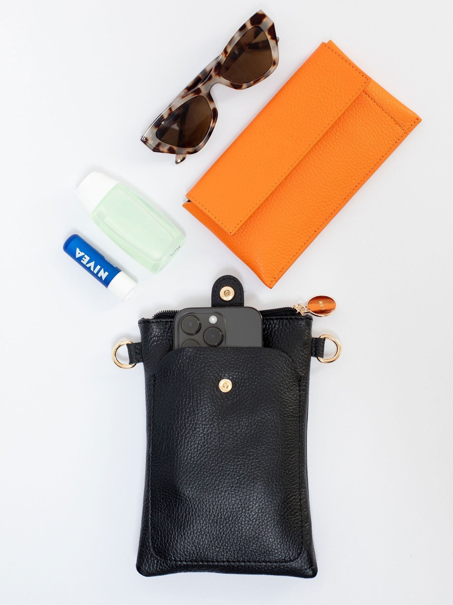 LRM Goods personalised leather phone bag - British product