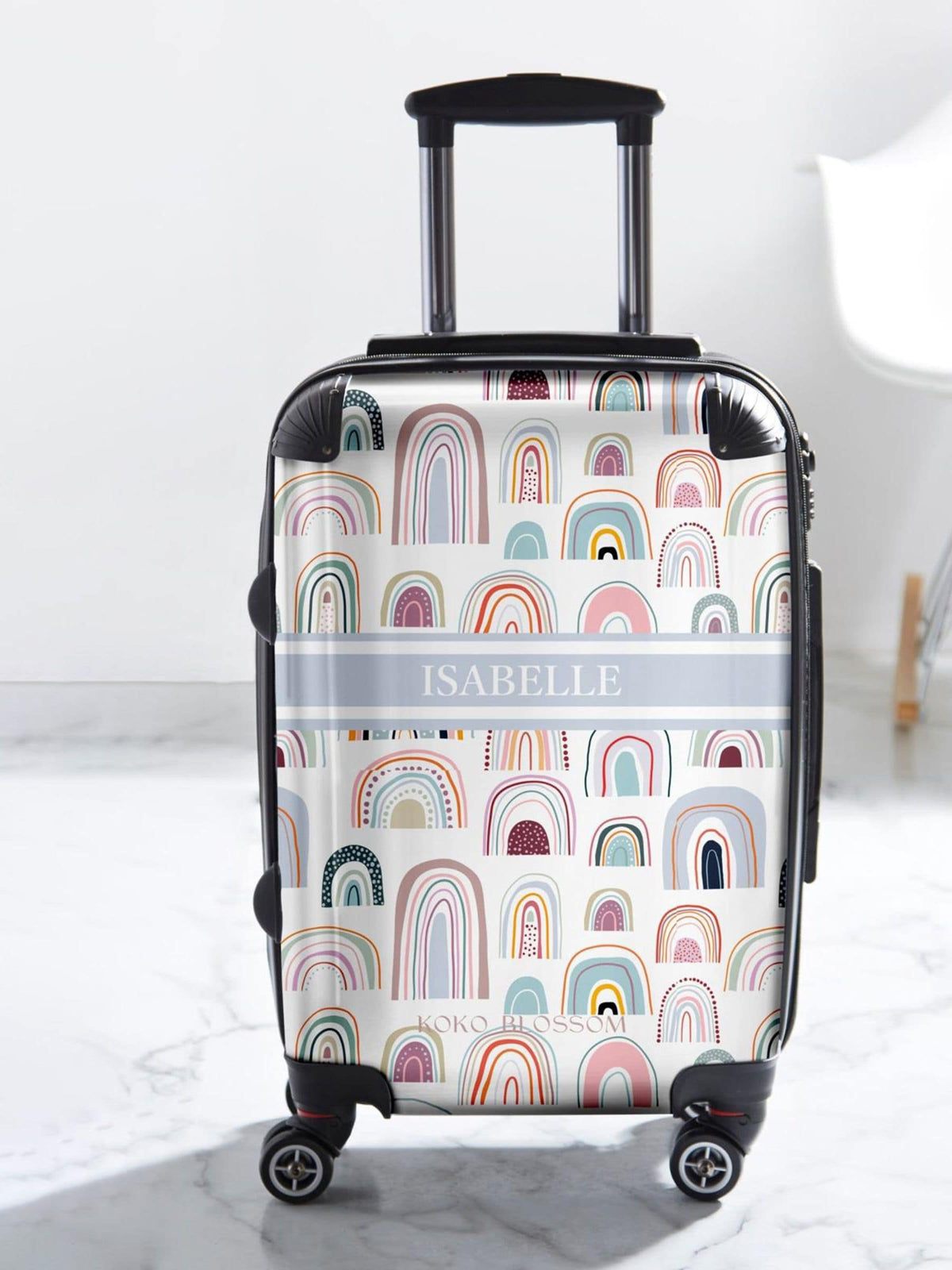 Koko Blossom personalised rainbow suitcase, imported from the UK