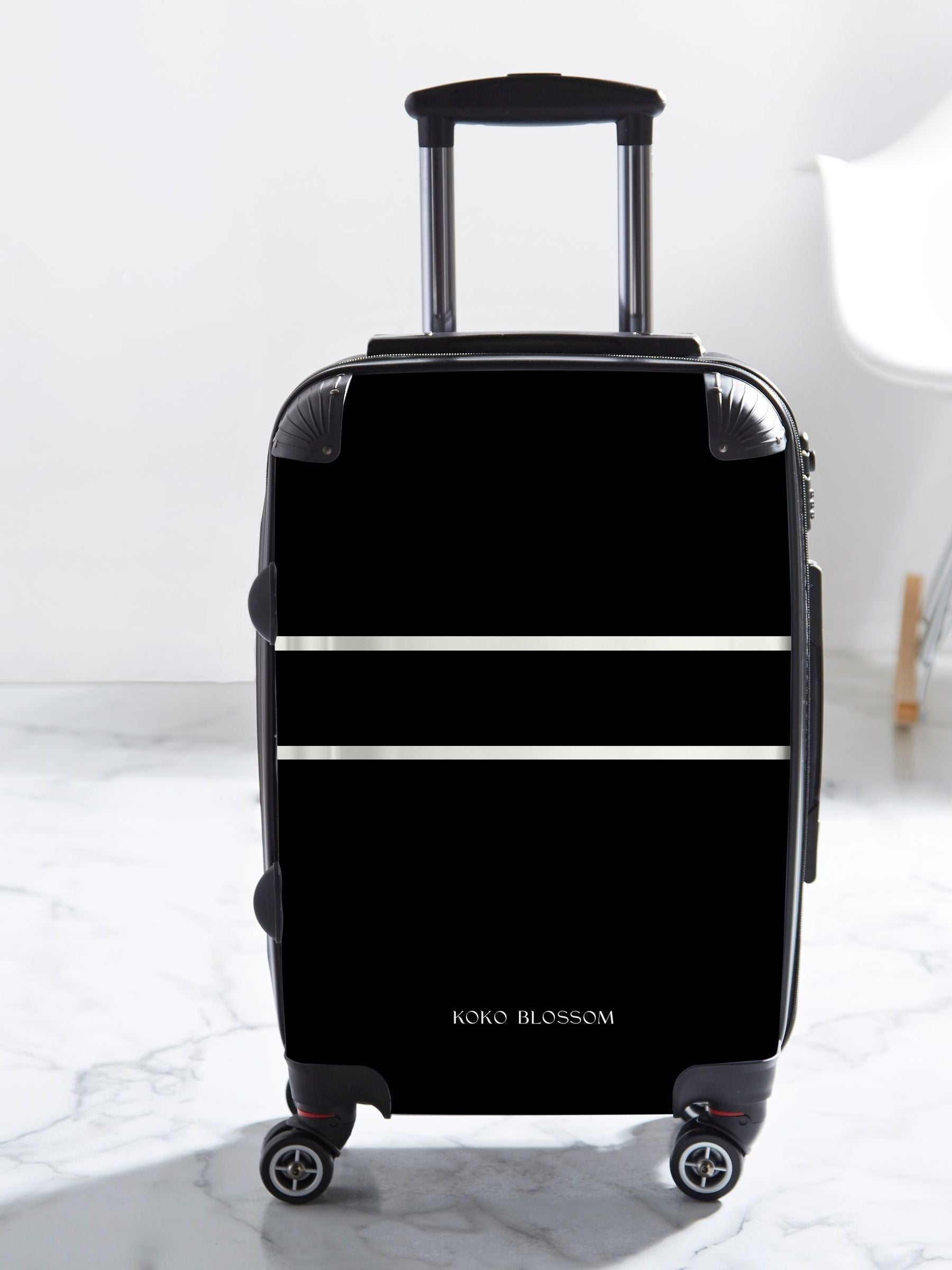 Koko Blossom black Tanlines suitcase, imported from the UK