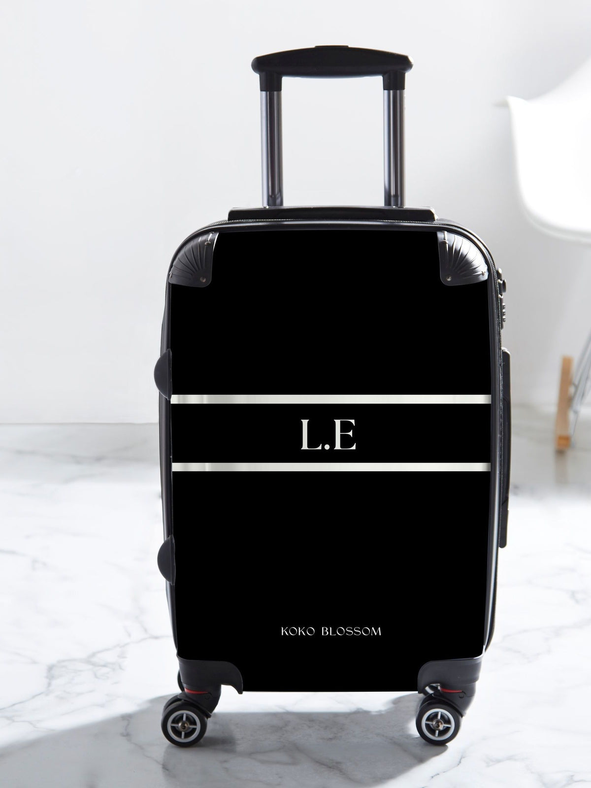 Koko Blossom black Tanlines suitcase, imported from the UK