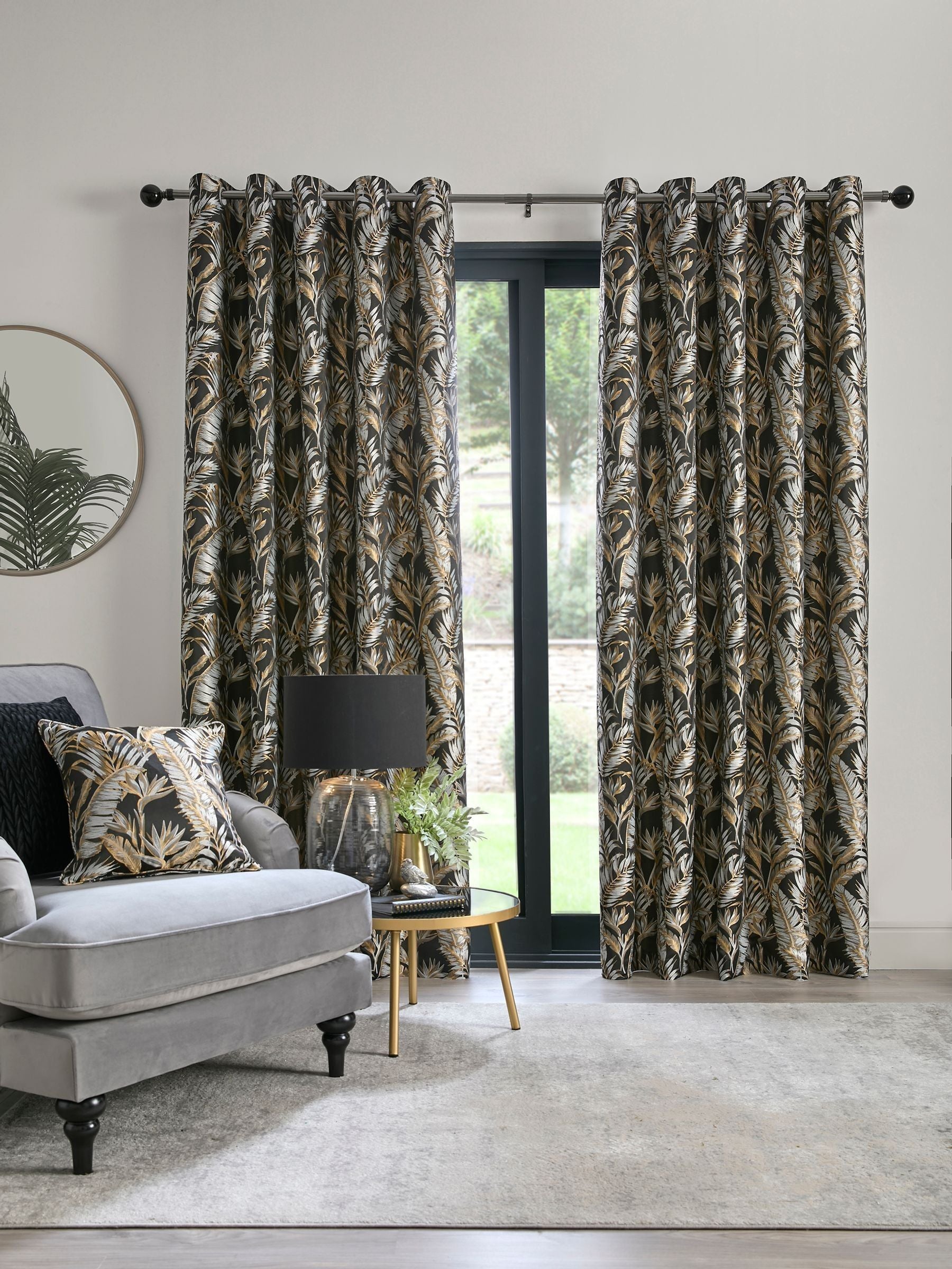 Laurence Llewelyn-Bowen black paradise palm jacquard eyelet curtains, imported from the UK