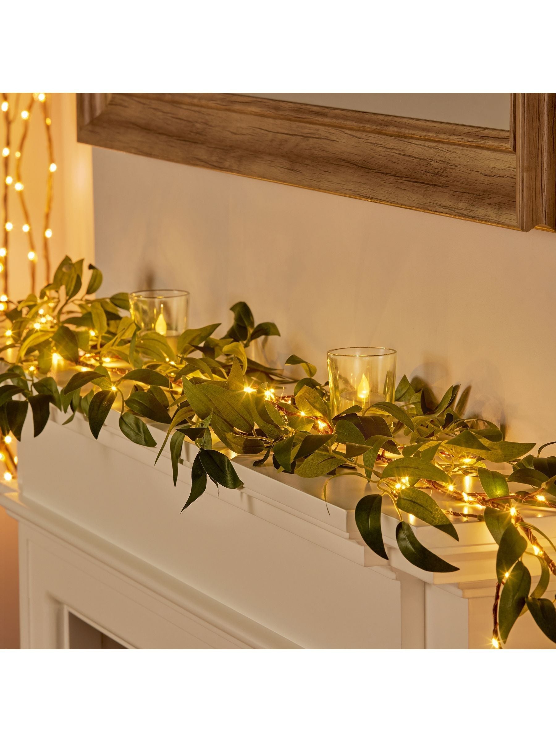 Premier Decorations Ltd Green Leaf Garland with Warm White Micro Brigh Lights 1.5m, imported from the UK