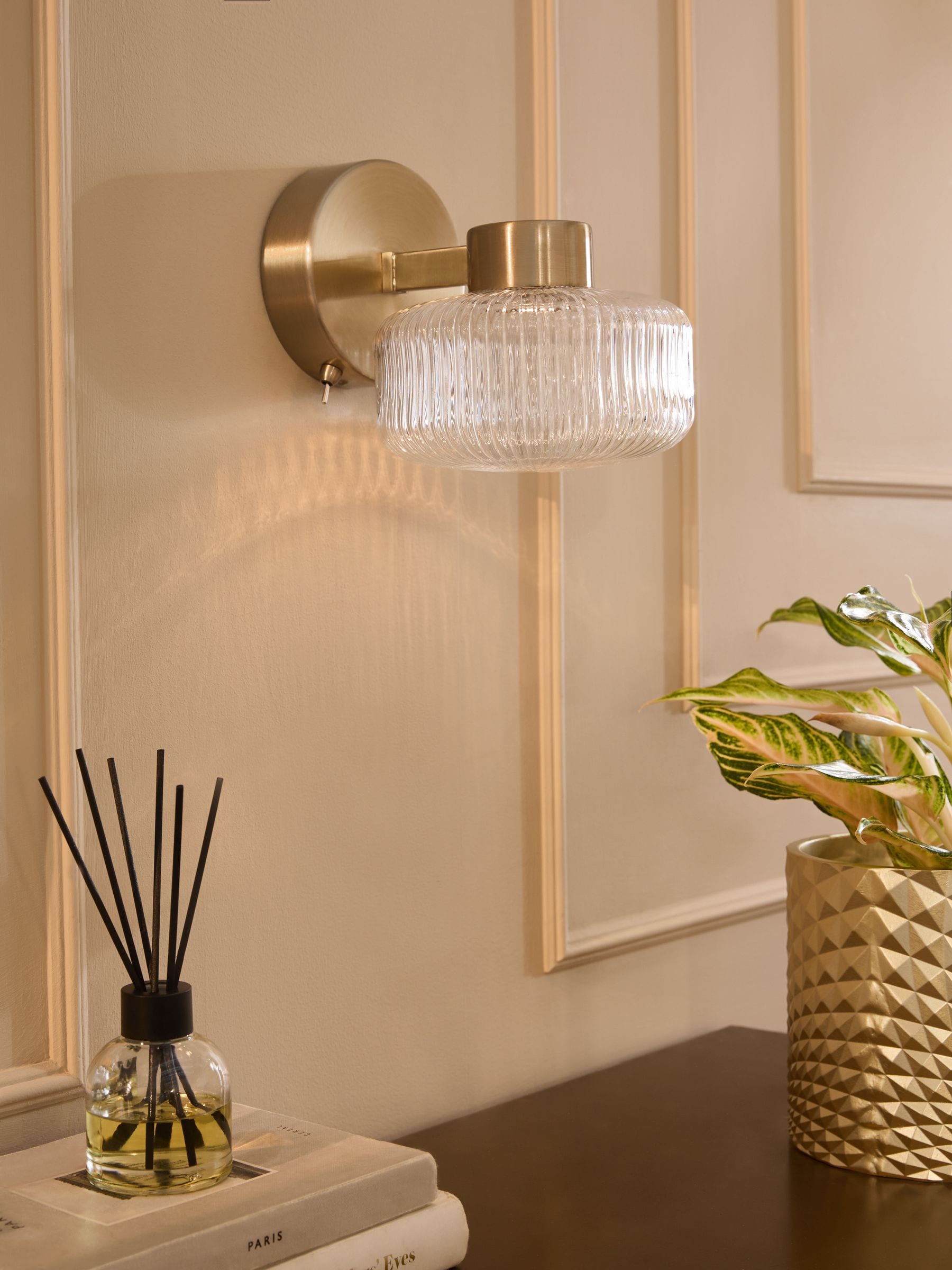 Brass rechargeable Lexington wall light with ribbed glass shade, imported from the UK