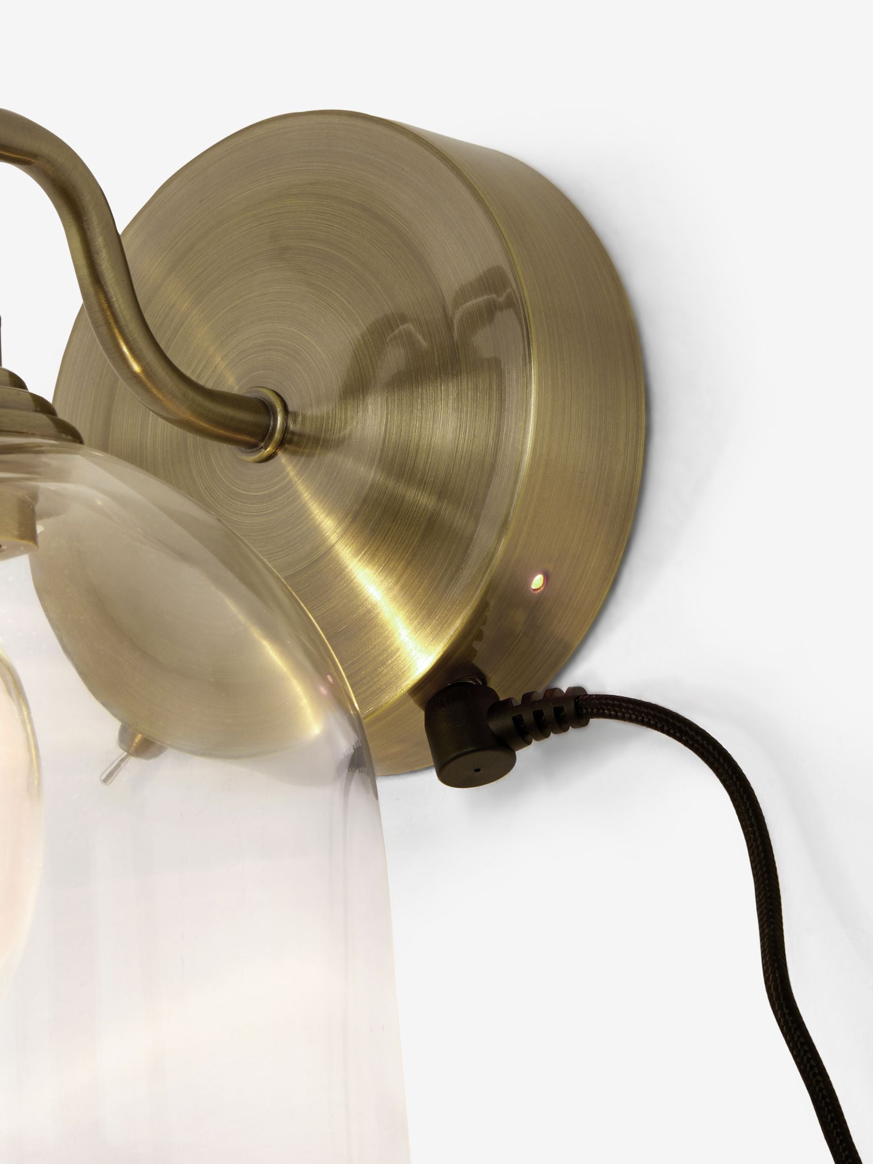Gloucester wall light with clear glass and brass accents, UK version