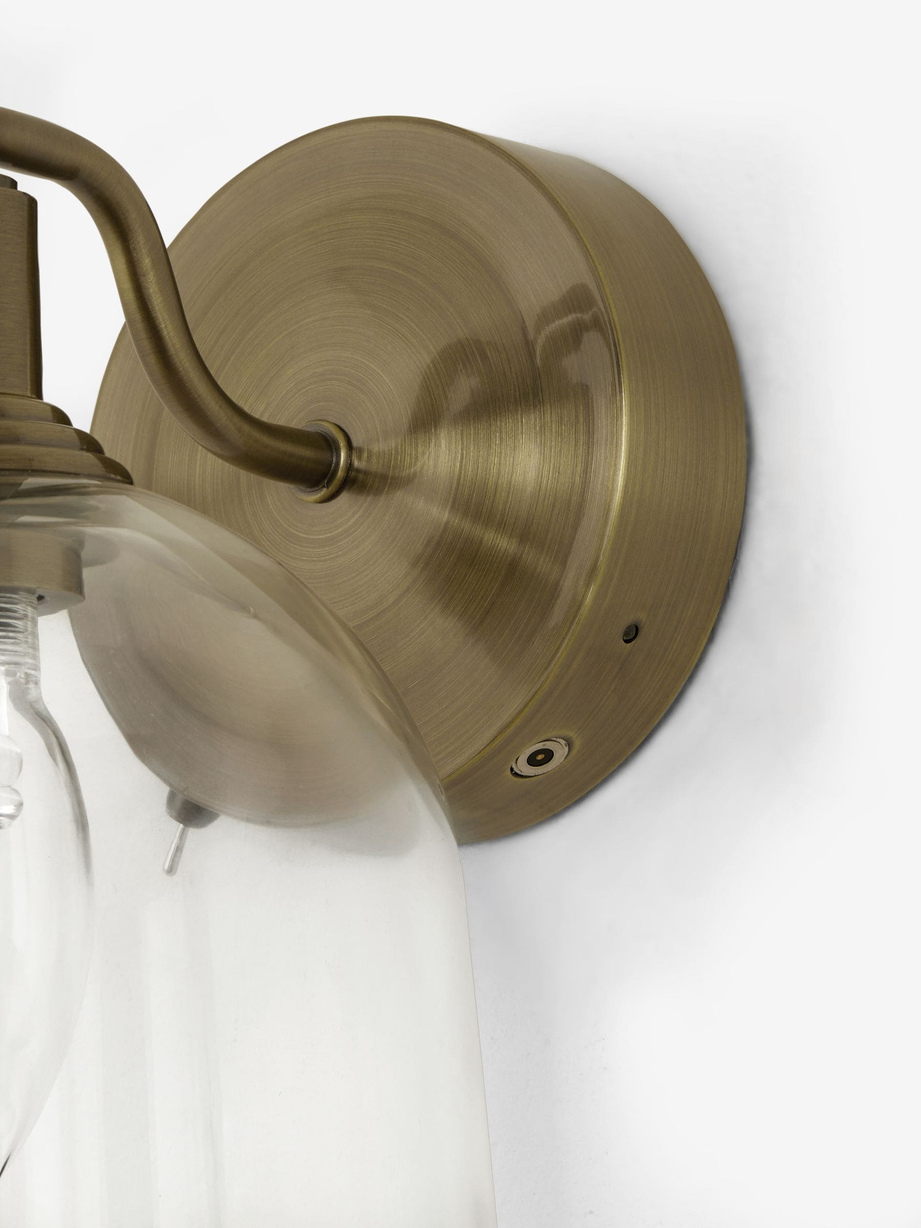 Gloucester wall light with clear glass and brass accents, UK version