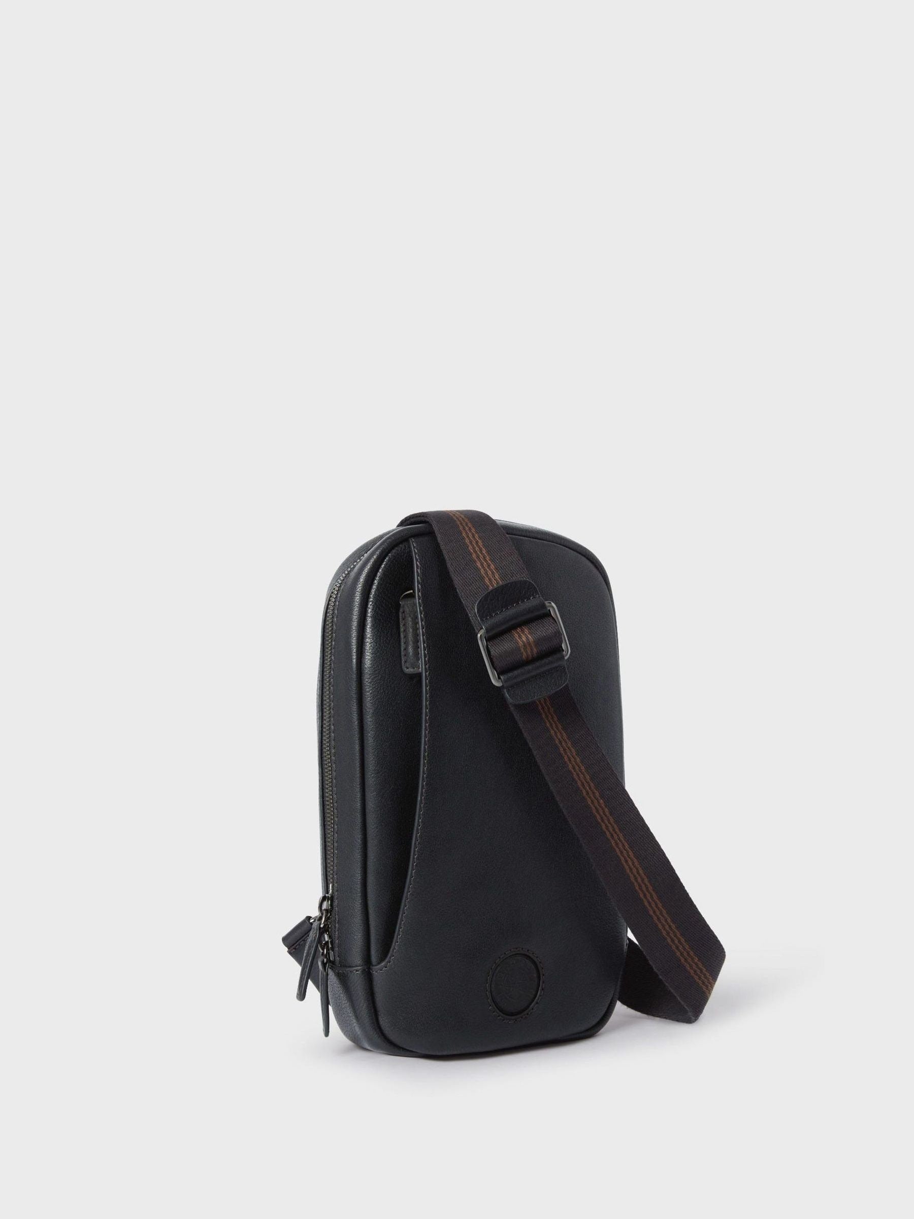 OSPREY LONDON black leather compass sling bag, imported from the UK
