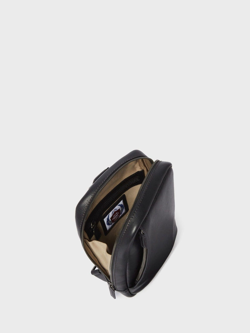 OSPREY LONDON black leather compass sling bag, imported from the UK