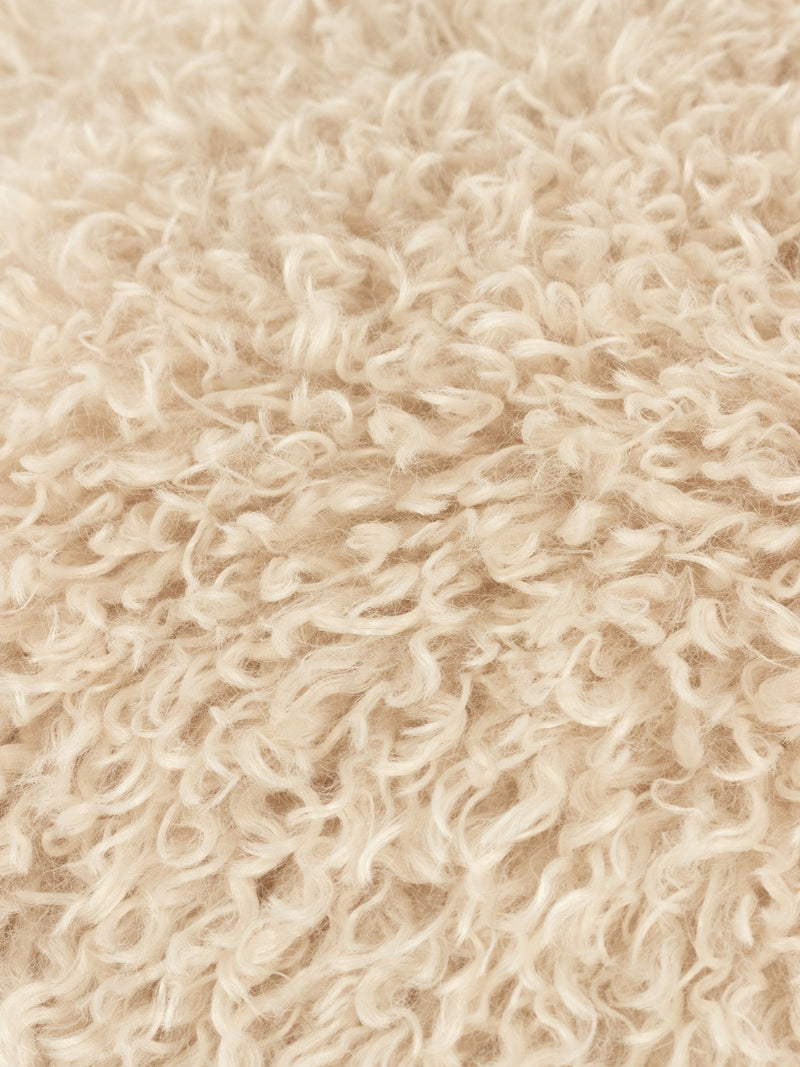 Furn natural beige faux fur cushion, imported from the UK