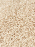 Furn natural beige faux fur cushion, imported from the UK
